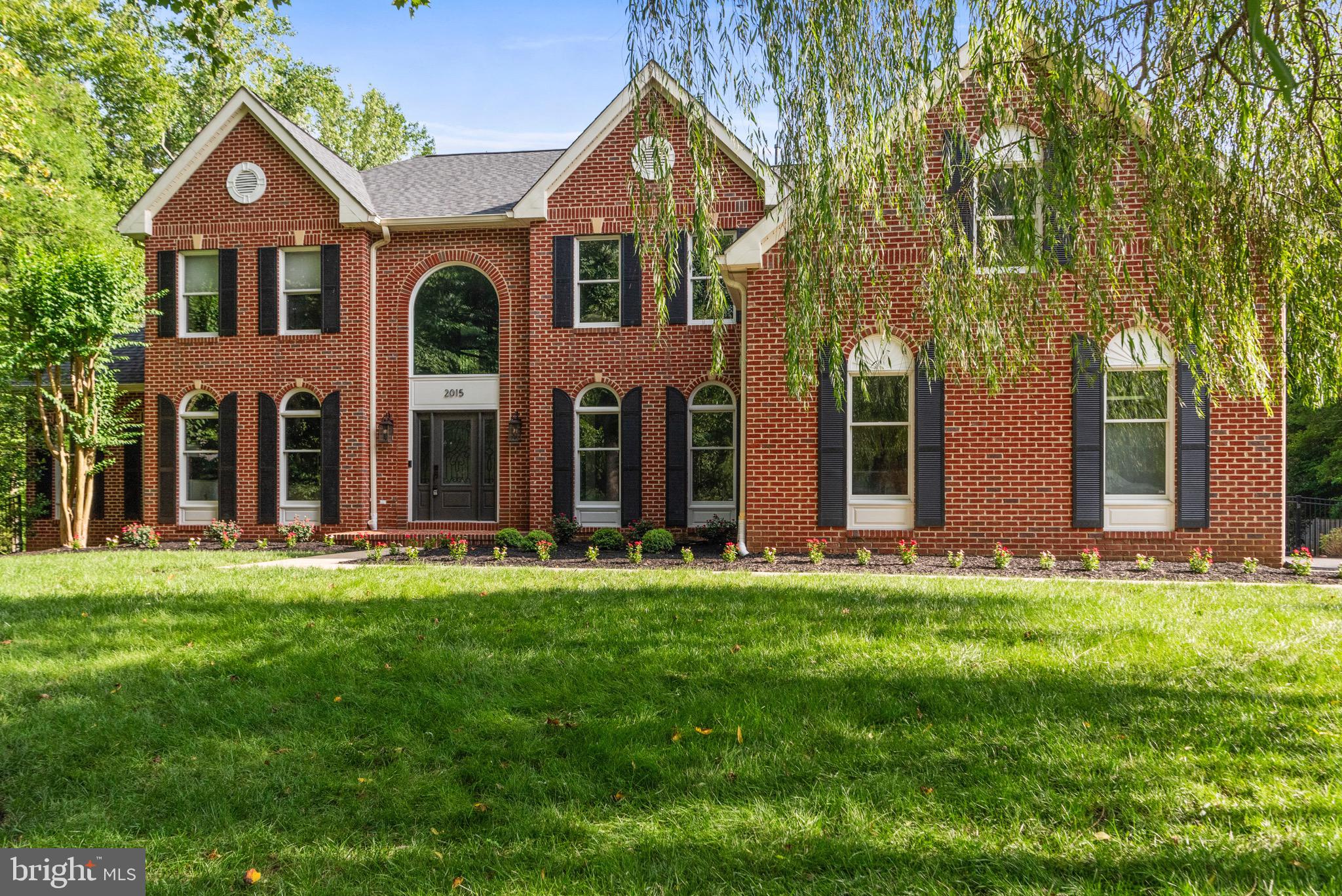 Welcome to this magnificent residence located in the prestigious Annapolis Preserve, offering an unparalleled blend of luxury, elegance, and modern amenities. Nestled on a sprawling 2-acre lot, this expansive property is approximately the size of two football fields, bordered by a serene nature preserve for ultimate privacy.
 
Expansive Lot and Modern Amenities
 
As you approach this stunning home, you'll be greeted by beautifully landscaped grounds and a majestic Weeping Willow. The slightly elevated setting enhances the grandeur of this over 7,600 sq ft estate, featuring a brick and vinyl exterior with contemporary design elements. The exterior boasts multiple garden areas with stone hardscaping, extensive evergreen privacy tree fencing, a three-car custom finished garage, and a large swimming pool.
 
Exquisite Interior Design
 
Step through the modern glass door into the foyer, where 6-inch maple herringbone floors and a chic, 2 story foyer, adorned with stunning custom detailing in the feature nook. The foyer opens to a large dining room with elevated ceilings, handsome millwork, and an exquisite living room.  Featuring a main level primary bedroom with exposed brick, large walk in closet and en suite bathroom. 
 
The spacious kitchen opens to the family room with a vaulted ceiling, spectacular full-height windows, and a stone fireplace. The kitchen boasts a spacious island, state-of-the-art appliances, and a breakfast room, making it perfect for both serious cooking and informal entertaining.
 
Main Level and Upper Level Retreats
 
The front staircase, with an elegant chandelier, leads to the upper level, offering four large bedroom suites. The primary bathroom overlooks the pool and features a vaulted ceiling with a skylight that bathes the room in natural light. Adorned with Brizo fixtures, a BainUltra ThermoMasseur soaking tub, a humidity-tight spa-like shower, a Toto washlet toilet, and dual custom vanities, this space provides a true retreat within your home.
 
The lower level features a full entertainment area with a nicely designed kitchen and a spacious family room with a fireplace.  Additionally, another guest suite, a full bath, and plenty of storage, perfect for an in-law suite.

This home is equipped with a Bowers & Wilkins sound system, Wifi Appliances, an advanced irrigation system controlled by an app that adjusts watering schedules based on weather forecasts. This extraordinary residence perfectly balances sophistication and comfort, offering a truly unique living experience.
 
This luxurious residence has been meticulously customized and remodeled by the current owners, ensuring that every detail has been thoughtfully considered. Don't miss this opportunity to own a truly exceptional home in one of Crownsville's most sought-after neighborhoods.