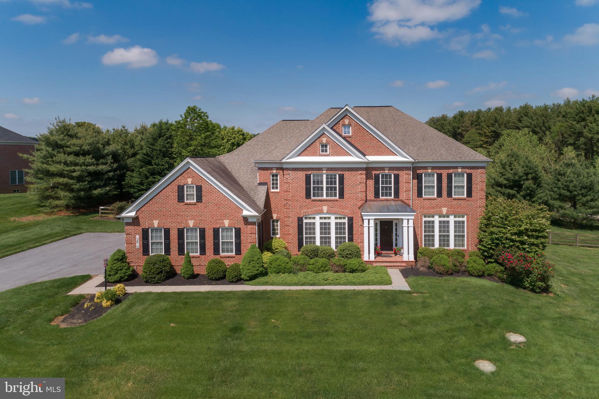 This gorgeous Belmont Farm home is a true getaway! Impressive millwork, abundant natural light, 2-story, tray & cathedral ceilings plus gracious proportions and remarkable outdoor elements  have been expertly combined to offer a property that effortlessly accommodates all of your domestic AND entertaining needs & desires . The circular main level floor plan easily accesses every living space including a Study, Morning Room and Sunroom.   The capacious Master Suite features a tray ceiling & custom plantation shutters; separate Sitting Room w/ gas fireplace; sizeable Master Bath w/ garden tub & new marble shower and an expanded Dressing Room  w/ a huge walk-in cedar closet annex!   Each UL bedroom contains its own EnSuite Bath - no sharing! The finished , walk-out Lower Level provides open, versatile space for your gym, media area or rec room, a 5th BR & Full bath - perfect for Au-Pair/In-Law visits. Enjoy the peaceful view out back of the meadow while you're lounging by the sparkling pool or grilling on the deck.