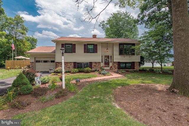 Beautiful Bi-level on a 1 acre lot with mature trees. A rare find! Totally renovated top to bottom. Custom kitchen, & 2 full baths. Economical Gas heat, public water & public sewer. In-ground Crystal pool surrounded by a stamped cement patio. Truly a back yard oasis! A 1 yr home warranty for peace of mind is included.