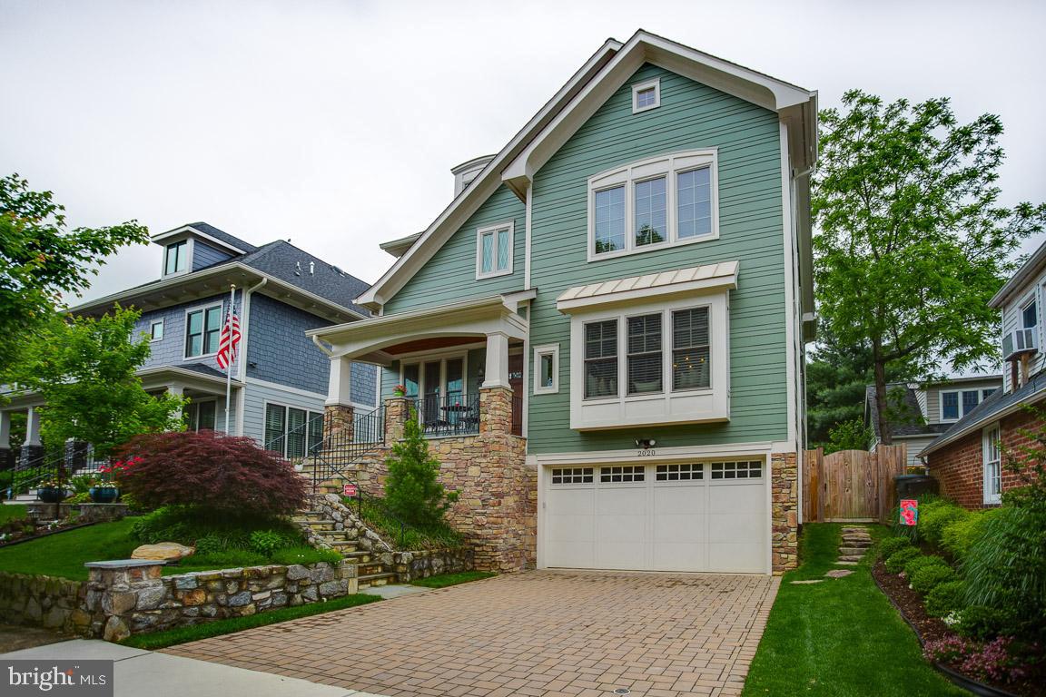 Private, quiet and serene, this 3.5 year nearly new single family home is just minutes from downtown Crystal City and Pentagon City in the highly sought after  Addison Heights  neighborhood.  A short 15 minute walk to Pentagon City or Crystal City metro, walking distance to over 50 restaurants, and a quick 5 minute Uber ride to Reagan National Airport.  This home boasts 4800+ sqft of living space on 4 levels with 5 bedrooms, 5.5 custom bathrooms, 2 car garage, driveway and plenty of street parking.  Custom built by renowned builder Troutman Homes completed in Dec 2015.  This home is fully upgraded with a gourmet kitchen, high-end 6 burner gas stove and convection oven as well as a separate microwave-convection oven, decorative back-splash, custom 42  soft close feature cabinets and pull out drawers.  Leatherized granite counters and a custom 9 ft plus granite island is perfect for entertaining.  Just adjacent to the kitchen unveils a private nook great for morning breakfast.  The butler s pantry is fully equipped with a wine fridge, more cabinets, sink and large pantry.  From the butler s pantry, enter into an elegant dining room where dinner is served under a unique tray ceiling with rope lighting.  You will find custom window benches and cushions in the dining and foyer areas.  The large owner s suite radiates of natural light, large custom walk in closet and a bathroom with dual vanities, soaker tub and a large dual head glassed in shower and pocket doors.  Three other en-suite bedrooms and the laundry room are located on the same level.  The fourth level is complete with a full bathroom and closet, great for an exercise or theater room.  With over 1100+ sqft, the fully finished walk out basement has an open recreation room, private bedroom, full bath and extra storage under the stairs.  Four gas fire places built throughout the home provide additional warmth on cold Arlington nights.  The 7 ceiling fans offer comfort from room to room on the hot summer nights.  The dual zone, high efficiency Carrier HVAC units are quiet and energy efficient.FEATURE ALERT:  Saved the Best for LastCustom built screened in porch, equipped with a gas fire place and ceiling fan to accommodate any weather conditions.  Great for sipping morning coffee or unwinding with a glass of wine.  The porch leads to a botanical garden in the backyard with over $50K in hardscaping and landscaping, with so many colorful perennials and flowering trees that will blossom and bring summer into full effect.  Beautiful outdoor lighting in the front and back as well as a full landscape irrigation system.  This home is also fully fenced and has stone pavers surrounding the home.ADDITIONAL INFORMATION:Original owners - This home shows better than new.  Only 2 people have occupied this spacious home 6 months out of the year.  Music lovers dream, central music system on the 2 main living floors.  Custom finishes include solid oak wood floors, transom windows, granite in all full bathrooms, unique lighting fixtures, built-in window treatments, upholstered drapery, full house humidifier and much more. 1 year HSA home warranty included.  This is a MUST SEE and won t last.