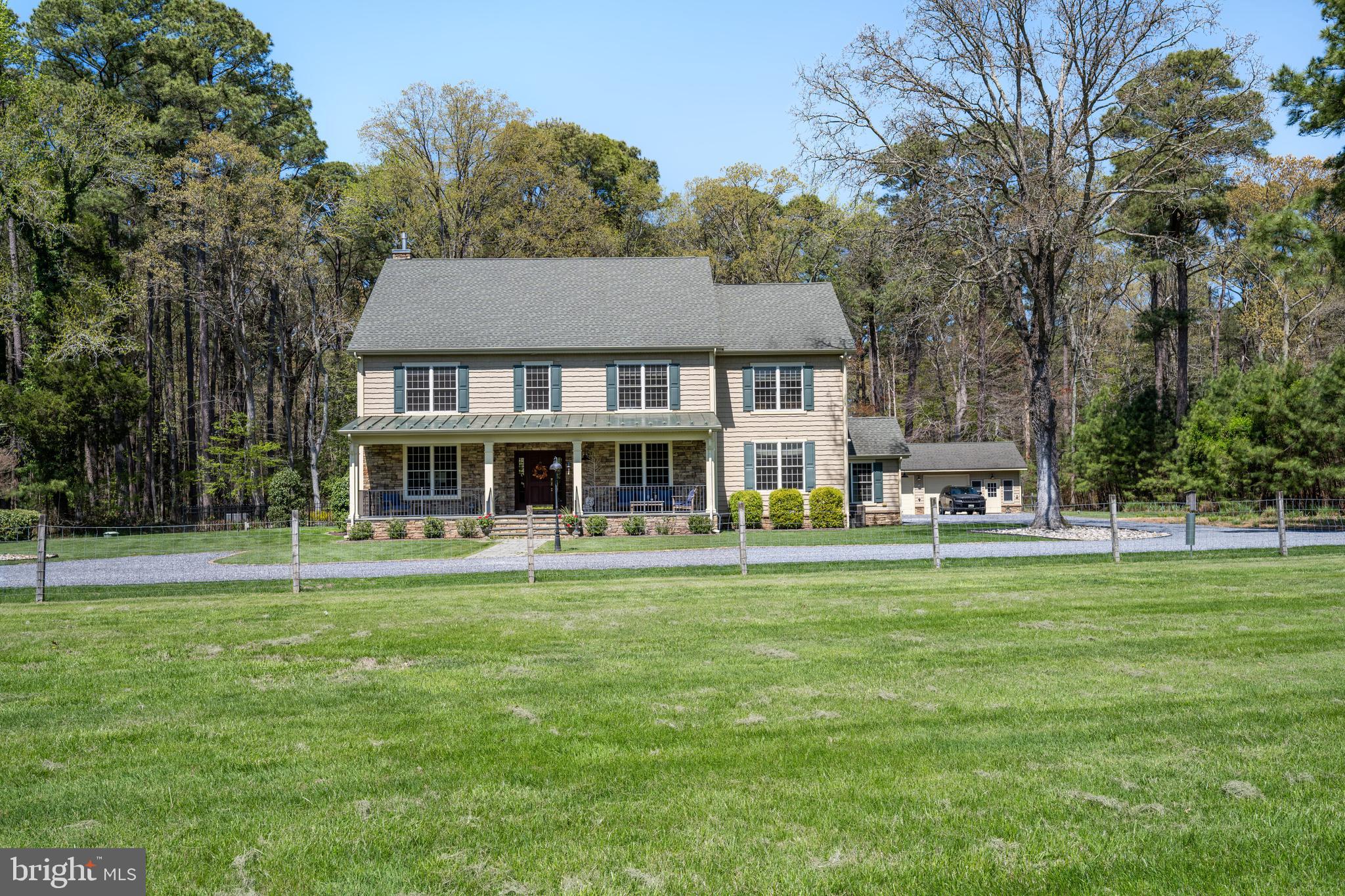 Set on 19.5 private acres just minutes from historic waterfront Saint Michaels, this exceptional 4,492 sq ft residence offers the perfect blend of space, privacy, and convenience.  The home features four bedrooms and two and a half baths, with expansive living areas ideal for both everyday living and entertaining, including a well-appointed chef's kitchen.  The thoughtfully designed layout includes a designated space for a future elevator, adding flexibility and long-term convenience. A separate car barn provides ample storage for vehicles, hobbies, or workshop space.  Enjoy the nicely fenced rear patio area, perfect for outdoor relaxation or entertaining.  Surrounded by peaceful countryside yet close to the charm, dining, and waterfront attractions of downtown Saint Michaels, this property presents a rare opportunity to enjoy Eastern Shore living at its finest.
**Note the forest area behind the house has been put into the DNR's Forest Stewardship Plan which allows the home owner to keep the AG tax discount without having to grow crops and/or livestock.