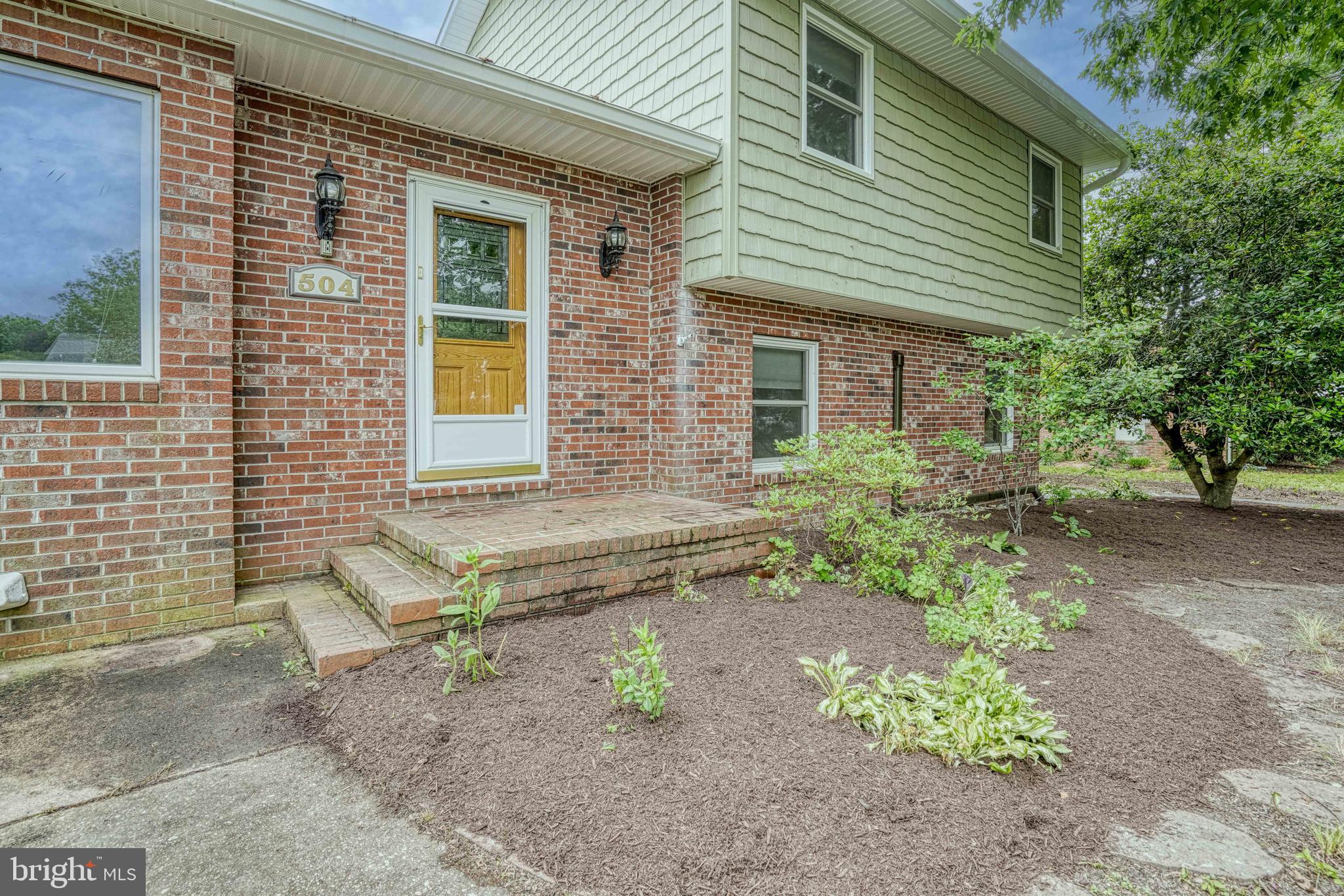 Welcome to 504 Bainbridge Place in Easton, ideally located near Route 50, Easton High School, and the Elks Club. This sought-after location offers both convenience and community. The property is improved with a well-maintained 3-bedroom split-level home featuring numerous upgrades, including renovated bathrooms, updated AC, and mini-split systems throughout for added comfort and efficiency.

Additional highlights include a detached two-bay garage with overhead storage, alley access, and an elevator making it easy to send your items upstairs. Relax year-round in the sunroom overlooking the large, fully fenced rear yard — perfect for entertaining, pets, or outdoor enjoyment.