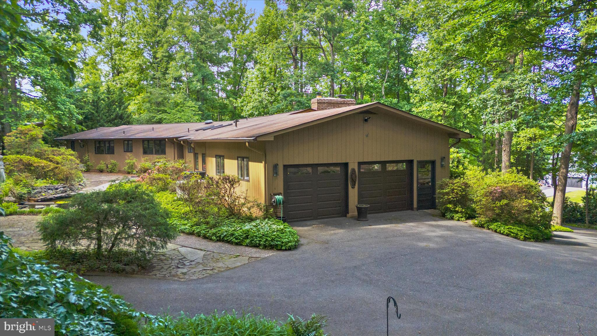 SCHEDULE YOUR PRIVATE SHOWING TODAY! This rare Harbor Hills gem won't last long! Nestled in one of the Annapolis area’s most sought-after neighborhoods, this spacious and private retreat offers an unmatched lifestyle. Inside, the home boasts five spacious bedrooms, warm hardwood floors, and two cozy fireplaces that create an instantly inviting haven. 
This property features a huge two-car garage, plus an additional detached garage, shop, and shed combo with almost an extra 1000 sq ft, making the possibilities endless. Outside, you can enjoy private relaxation or entertaining with multiple decks and extensive hardscaping.
Living in Harbor Hills, you'll have access to endless amenities including marina,, kayak rack, swimming pool, pickle ball, tennis courts, playground and ball fields.  With easy access to  downtown Annapolis, DC, and Baltimore, it's more than just a home.  It's a lifestyle!   OPEN HOUSE THIS SATURDAY!