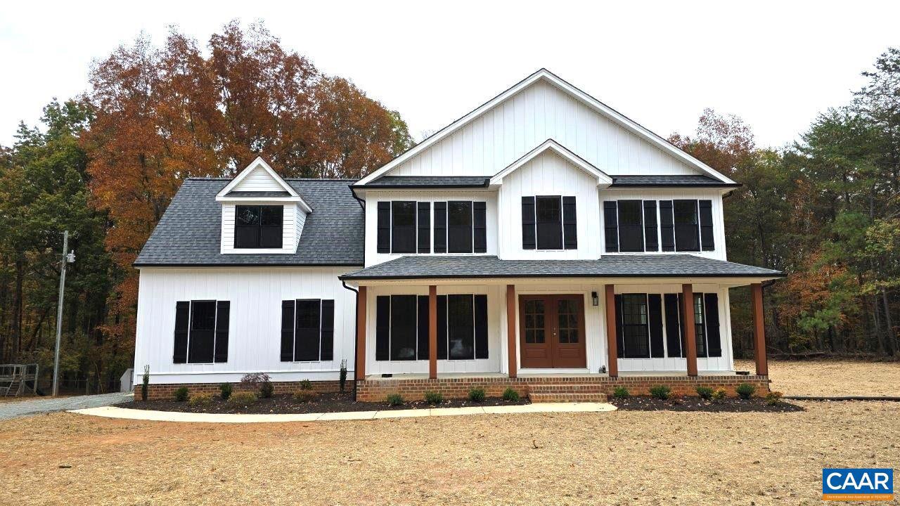 TO BE BUILT! The Ross model with upgrades galore 5 miles to Zion Crossroads! The welcoming front porch boasts 12? vertical Board and Batten siding on the front of the house, French front door with 3/4 glass, 2 wall lanterns and extra LED lights with dimmers, black gutters and windows, craftsman style shutters, stained columns, dormer, and a side load garage with opener. Interior upgrades include beautiful engineered hardwood flooring throughout the entire 1st floor, great room with fireplace, extra windows and LED lights, dining room with craftsman trim package, gourmet kitchen layout, upgraded stainless appliances, Granite counters, 3x8 double island with overhang and pendant lights, 42" Tier 2 cabinets and pantry with crown molding and under cabinet lighting, breakfast nook leading to the 10x14 deck. The oak stairs lead you up to the primary with trim box package, ceiling fan, extra window, leading to the ensuite bath with a transom window over the 5' tile shower, double bowl vanity and tile flooring. Adult height toilets in primary and half bath, LED overhead lights in 3 bedrooms, pull down attic stairs for storage and laundry finish out the second floor. Photos are similar to. No Water/Sewer/HOA. Winter completion.,Granite Counter,Wood Cabinets,Fireplace in Great Room