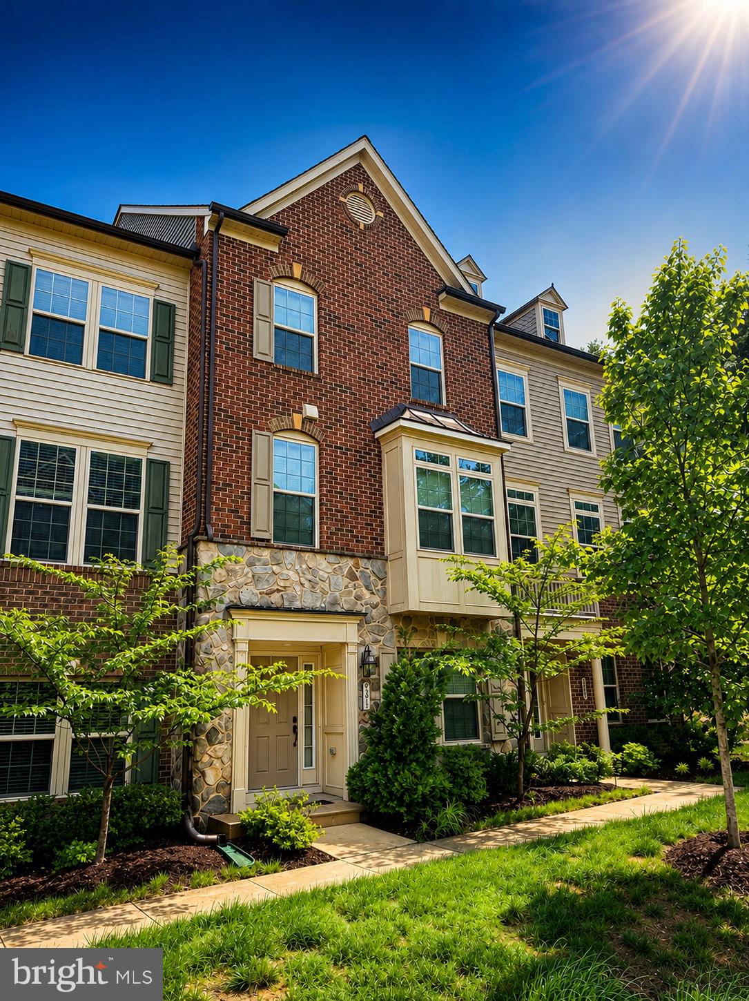 Welcome to one of Parkside's most desirable floorplans! This stunning luxury townhome offers FOUR finished above-grade levels of thoughtfully designed living space and nearly 3,000 square feet of modern comfort.

The ground-level entry features a versatile bedroom or flex space with a full bath and convenient access to the attached two-car garage, making it ideal for guests, a home office, or multi-generational living.

The main living level is an entertainer's dream, showcasing an open-concept floor plan with abundant natural light, a spacious living room, an elegant dining area, and a gourmet kitchen featuring granite countertops, stainless steel appliances, a large center island, and ample cabinetry.

The third level offers generously sized bedrooms, including a luxurious primary suite with a spa-inspired bath and walk-in closet, along with additional bedrooms and a conveniently located laundry area.

The impressive fourth level provides a spacious bonus room or additional bedroom complete with a private rooftop terrace, creating the perfect space for entertaining, relaxing, working from home, or enjoying beautiful sunsets.

Located in the highly sought-after Parkside community, residents enjoy exceptional amenities including a clubhouse, outdoor pool, fitness center, walking trails, playgrounds, and community green spaces. Conveniently situated near Fort Meade, NSA, BWI Airport, commuter routes, shopping, dining, and entertainment.

4 Bedrooms | 4.5 Bathrooms | Approximately 2,926 Square Feet | Four Finished Above-Grade Living Levels | Attached Two-Car Garage

Don't miss this rare opportunity to own one of Parkside's most versatile and impressive townhome designs!