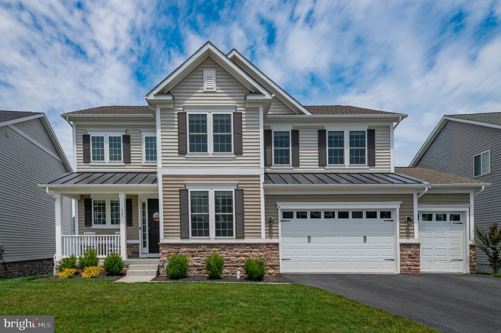 Welcome to luxury living in the highly sought-after Brunswick Crossing community! Built in 2023, this stunning Richmond American Homes Presley model impresses the moment you step through the front door into a dramatic two-story foyer featuring a wide, elegant oak staircase. The open, flowing layout spans three fully finished levels with premium upgrades throughout, showcasing soaring nine-foot ceilings and striking eight-foot doors that frame the light-filled spaces beautifully. Working from home is a breeze on the main level, which hosts a large private office complete with classic French doors. At the heart of the home is a large gourmet kitchen featuring a central island, a convenient walk-in pantry, and an adjacent morning room that seamlessly transitions into a comfortable family room anchored by a sleek Cosmo fireplace.

Indoor comfort effortlessly extends outside to a welcoming front porch and a top-of-the-line deck, which overlooks and accesses a level yard perfect for outdoor relaxation. Upstairs, you will find four expansive bedrooms, all boasting ample closet space, and three full bathrooms. The primary suite serves as a true private sanctuary, featuring a massive walk-in closet, and a luxurious bathroom featuring a Roman shower complete with double shower heads and built-in seating. The finished walkout basement expands your living options with a fifth bedroom—also equipped with generous closet space—and a fourth full bathroom, opening directly to a lower patio and the level yard. This lower level also boasts two additional finished bonus rooms that are ideal for a home gym, hobbies, or media center. Complete with a rare three-car garage and a dedicated extra equipment bay, this property provides unmatched storage and functionality.

Beyond the front door, the premier Brunswick Crossing neighborhood provides a resort-style lifestyle featuring a beautiful community center and swimming pool, tennis courts, a soccer field, beach volleyball, a dedicated dog park, and miles of scenic walking trails. This particular property enjoys a prime location within the community, offering an easy, walkable commute directly to Brunswick Elementary School. For commuters and outdoor enthusiasts alike, Brunswick is a dream location. The city features a MARC train station for a stress-free commute directly into Washington, D.C., and sits just 45 minutes from Dulles International Airport and other major employment hubs in Northern Virginia. When the weekend arrives, endless recreation awaits nearby along the scenic C&O Canal and historic Harpers Ferry National Historical Park.