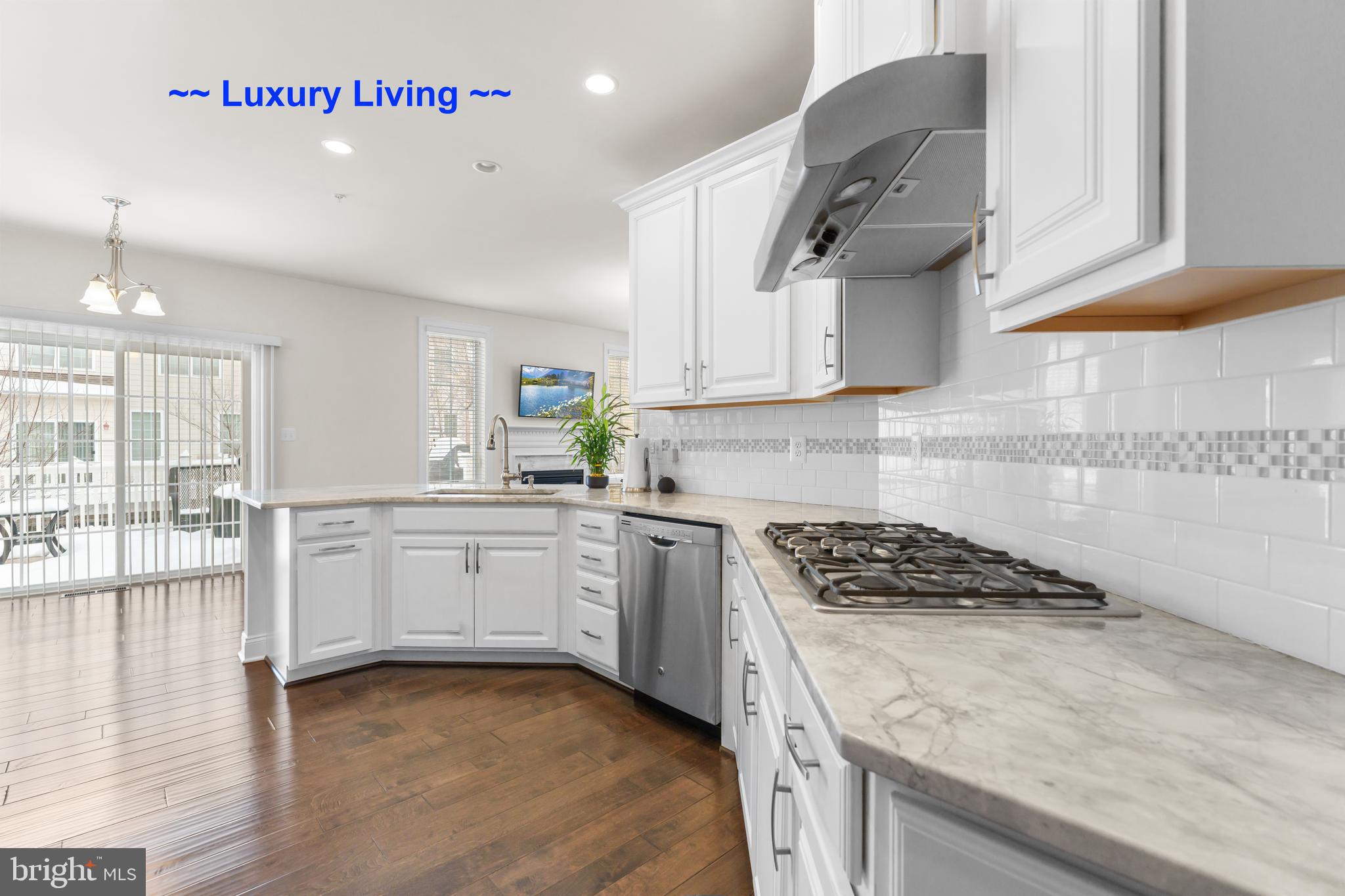 ***Buyer Closing Assistance is Available!  **Luxury living at its finest in The Enclave at Arundel Preserve!  **This immaculate, “Like New” 3-level townhouse features $50K in upgrades, including a Control4 smart home automation system.  **With just one touch, you can dim the lights, play music, adjust the temperature, lock the doors, arm the security system, and view the cameras from anywhere in the world using your smartphone!  **The home is also equipped with multi-room digital audio, wireless access points, and pre-wiring for a home theater.  **Boasting 3 spacious bedrooms and 2.5 bathrooms, this meticulously maintained home provides ample space for comfortable living and entertaining.  **Step inside and be greeted by an inviting foyer that leads you to a bright and airy living area.  **The floor plan seamlessly connects the living room, dining area, and upgraded kitchen, creating a perfect space for gatherings and everyday living.  **The upgraded kitchen boasts sleek countertops, stainless steel appliances, ample cabinet space, and a butler's pantry, catering to both culinary enthusiasts and busy families.  **A highlight of this exceptional home is the private back deck, an ideal retreat for morning coffee or evening relaxation.  **Enjoy the serene views and fresh air while taking in the beautifully landscaped surroundings.  **The upper levels offer a sanctuary of comfort, with three well-appointed bedrooms that can serve as personal space, a home office, or guest accommodations.  **The owner's suite is a true oasis, featuring a tranquil ambiance with custom blackout shades, a walk-in closet, and a luxurious ensuite bathroom.  **The lower level includes a versatile basement that can be used as an office, gym, home theater, or family room.  **This level also has a bathroom rough-in, offering a perfect equity opportunity for new owners to add a bathroom if desired.  **Additionally, a new AO water heater was installed in 2024.  **The home also offers a spacious two-car garage with plenty of storage space and a large driveway.  **Beyond the confines of the home, The Enclave at Arundel Preserve offers an array of community amenities that cater to an active lifestyle.  **Take a dip in the sparkling community pool, challenge friends to a match on the tennis courts, or explore the scenic walking and running trails.  **Children and pets will enjoy the playgrounds and dog park, while the well-maintained landscaping enhances the charm of this lively community.  **Conveniently located, this townhome provides easy access to major highways, shopping centers, dining options, and entertainment venues. Whether you're seeking a serene escape or a bustling urban experience, 7608 Elmcrest Road offers the best of both worlds!  **Don't miss the opportunity to make this exquisite property your new home.  **Schedule a showing and experience luxury living! ****Buyer Closing Assistance is Available!