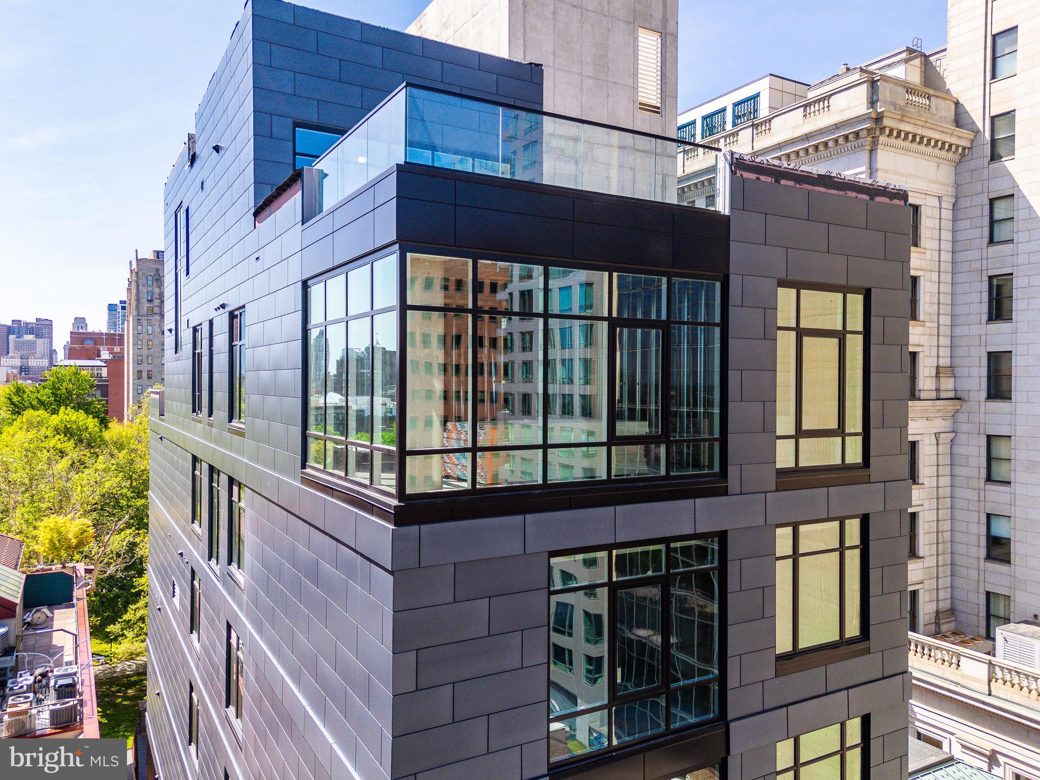 Experience the pinnacle of modern Philadelphia living at 223 S 6th Street #PH ​-  the Penthouse at The Dilworth House, an architectural landmark designed by CBP Architects and developed by Astoban Investments, one of the city’s premier luxury builders. This newly built residence unites contemporary innovation with timeless elegance, offering nearly 5,000 square feet of interior space and over 3,800 square feet of private outdoor terraces overlooking Washington Square Park, Society Hill, and the city skyline. There is truly nothing like it in Philadelphia.

A private elevator opens directly into a light-filled foyer leading to expansive living and dining areas wrapped in floor-to-ceiling glass with southern and western exposures that capture sunset and park views. The open-concept plan integrates an imported Italian Scavolini kitchen featuring Compac Quartz countertops, integrated Wolf, Sub-Zero, and Miele appliances, double ovens, and a built-in espresso system ​- all oriented toward the park and river-view terraces for effortless entertaining.

Each of the five ensuite bedrooms combines privacy with refined design. The primary suite offers a custom dressing room, radiant-heated marble floors, oversized soaking tub, frameless steam shower, and dual vanities, all finished with Italian tile and Pianca cabinetry. Secondary suites provide flexibility for guests, an office, or a private gym.

Designed for seamless indoor-outdoor living, this penthouse showcases multiple private terraces with unobstructed park, city, and river views, ideal for open-air dining or rooftop gatherings. State-of-the-art systems include Lutron lighting, ButterflyMX keyless entry, two-zone HVAC, and smart-home integration. The residence includes two on-site automated parking spaces within a fully mechanized garage and private storage.

Residents enjoy the exclusivity of a boutique building of only eight homes, built with reinforced concrete construction, soundproofing, and secure access. Monthly condo fees cover building maintenance, insurance, and amenities, and the property benefits from a Philadelphia tax abatement.

Perfectly positioned on Washington Square Park in the Society Hill district, this location places you steps from Talula’s Garden, Zahav, Morimoto, Independence Hall, and Old City’s cultural venues, with quick access to I-95, I-676, and 30th Street Station. The home’s setting blends historic surroundings with modern luxury ​-  a rare opportunity to own new construction with direct park frontage, panoramic city and river views, and unmatched outdoor space.( These 3D renderings are artist’s conceptual interpretations intended for illustrative purposes only. While they provide an accurate feel for the layout, some design elements, finishes, and architectural details are subject to change. Please expect minor  variations as final construction and staging are completed.)