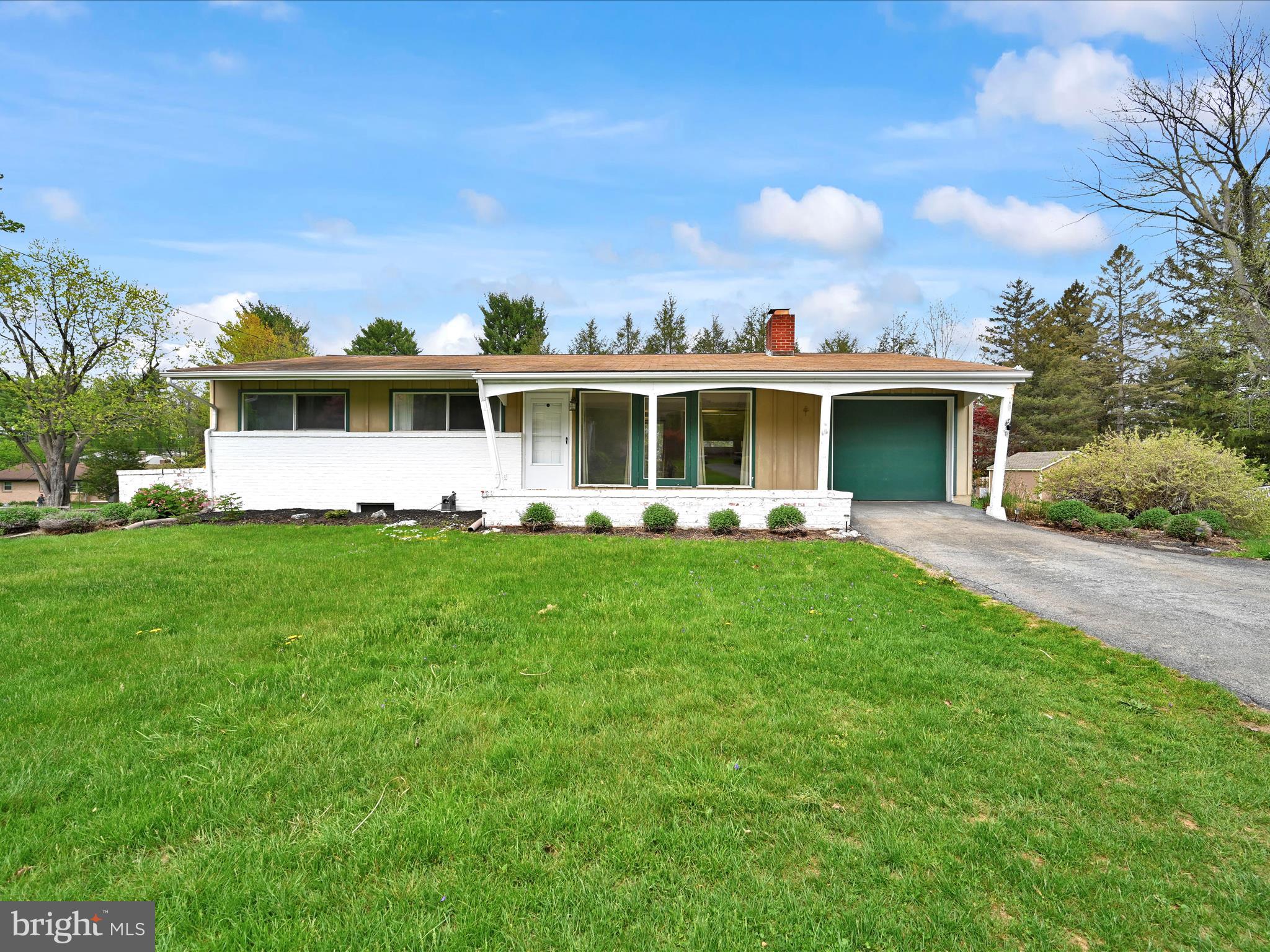 Bring your paint brush and step into classic mid-century modern, spacious one-floor ranch home, located in a well-established neighborhood in sought-after Manheim Township. Situated on a generous 0.4-acre lot, this 3-bedroom, 1.5-bath home offers solid construction, timeless design, and plenty of room to make it your own.
Inside, you'll find a welcoming living area centered around a brick fireplace, with large windows and a layout that highlights the clean lines and simplicity of mid-century modern style. 
An attached garage adds everyday practicality, while the spacious backyard and existing deck offer a great setting for outdoor gatherings, gardening, or simply relaxing.
This home is ready for updates, love, and care—bring your paintbrush and ideas to make it your own! With great bones and a fantastic location, it's the perfect opportunity for someone looking to add value and style in one of the area's most desirable communities.