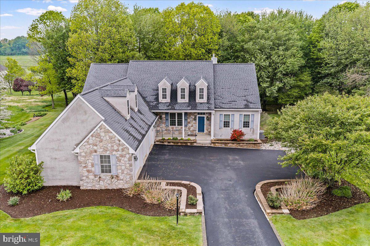 Country club living at it's finest!  Welcome to this beautiful home located in the ever-popular Wyncote community!  This home has been lovingly cared for and ready for it's new owner.  As you approach the home you will notice the lovely yard and lot on which it stands.  The colonial, cape exterior is such a classic look for your new home.  The driveway is nice a roomy for pulling into the home and the three-car garage is just perfect for your family needs.  The owner performed a pre-list stucco inspection and re mediated the stucco issues for you to enjoy too.  The front of the home had no issues, but the owner replaced the other three sides of the home with Hardi Plank! Step inside to a nice sized foyer and notice the hardwood floors everywhere.  To the left is a living room/sitting room which adjoins the family room in front of you.  What a great layout for entertaining!  The family room has a gorgeous wood paneled wall with a fire place. And there is a wall of windows to let an abundance of light into the room.  The kitchen sits just off of the family room so it is truly the center of the home!  The island is situated for daily prep work or for presenting food for a party.  And the extremely long breakfast room is the most beautiful room to sit in for your daily meals.  There is a french door out to a screened in deck.  I'll be you'll spend hours in this tranquil spot!  Take your morning coffee or your evening cocktail to the covered deck and let hustle and bustle of the world leave your mind.  The first-floor primary bedroom is very large and has two big walk-in closets. The primary bath is huge!  There are two separate sinks, a soaking tub, shower stall with a bench and a separate toilet closet.  On the other side of the home there is a full bath with a bedroom on the left and on the right (or you can use it as an office like the current owner).  The laundry room completes the main floor.  Upstairs is perfect for an adult child or for guest as it is quite private. There is a full bath and a bedroom as well a large storage closet on the second floor.  Need more space?  Head to the basement where you find another bedroom/craft room/office/flex space with an adjoining full bath.  There is a great room/second family room along with a bar area with tons of cabinetry and a second refrigerator.  There are doors from this area out to a beautiful patio overlooking the back yard.  There is a huge storage area in the basement too. This basement seems to go on forever!  And there are double doors from the unfinished area of the basement out to the back yard.  What an easy way to bring in your patio furniture for the winter!  All of this just off of Rt 1 and next to the Wyncote Golf Course.  Come and see the best of both worlds... country living with quick access to major roadways, shopping and restaurants.  Welcome home!
