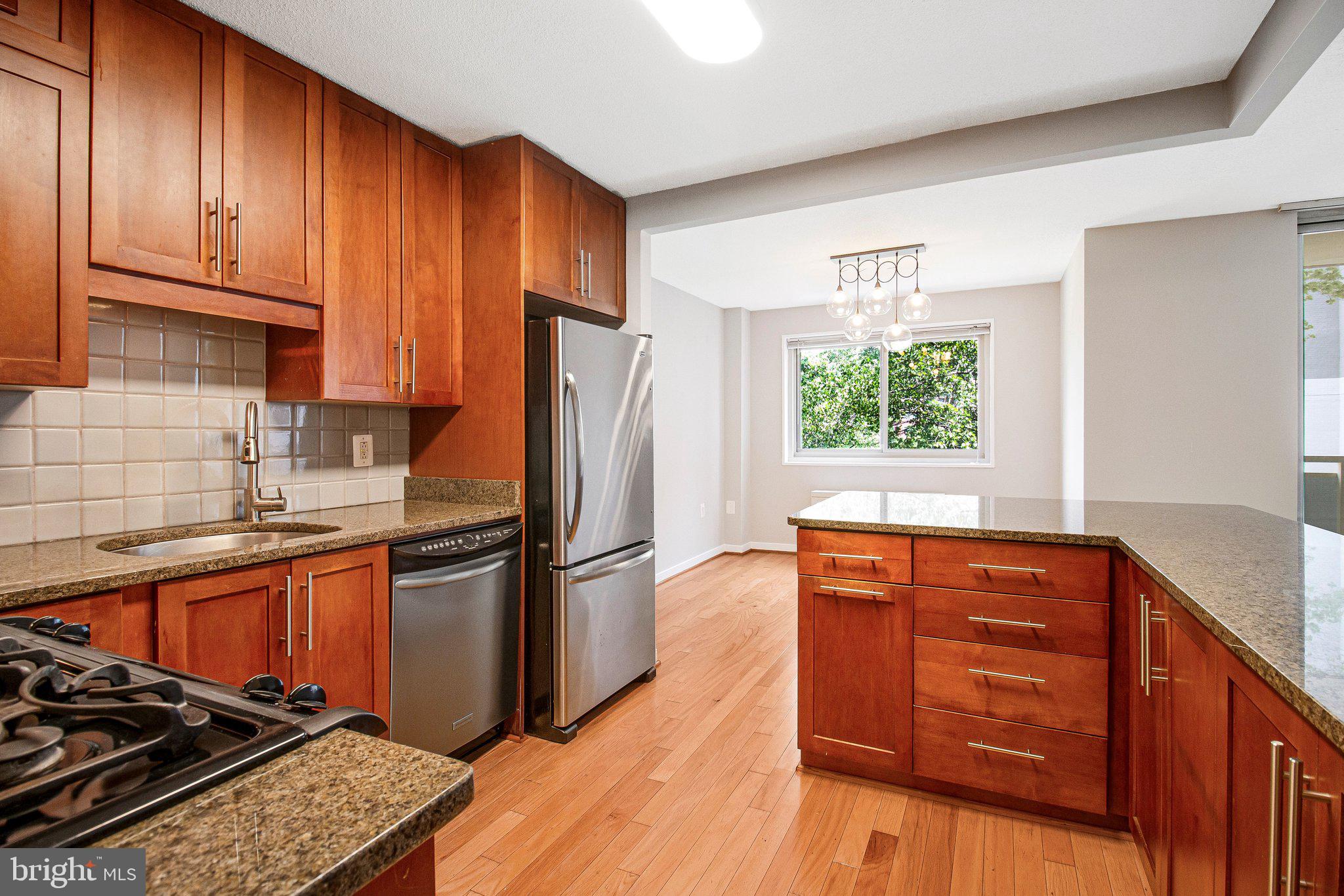 Own for Less Than You're Paying in Rent — Takoma Park Condo, Priced Right
Why rent when you could own this for less? This beautifully updated 1BR/1BA in the heart of Takoma Park is priced to move, and the numbers speak for themselves.
980 square feet of bright, open living space. Freshly painted throughout, with hardwood floors in the main living areas and brand-new carpet in the primary bedroom. Step onto the north-facing balcony and take in mature shade trees and a peaceful view over the community garden — cool in summer, and a rare bit of green this close to everything.
In-unit laundry, and a premium assigned parking space right outside the rear door make everyday life easy. The building's amenities feel like a resort: pool, tennis court, BBQ area, courtyard and garden spaces, bike room, fenced dog area, and secure elevator entry. The monthly condo fee covers all utilities plus pool membership, so your monthly costs are fixed and predictable — no surprises, no rent hikes.
Shopping, dining, and transit are all just moments away.
At this price, in this location, with costs this low, this could be “the one”.  Photos don't do it justice. Schedule your in-person showing today.