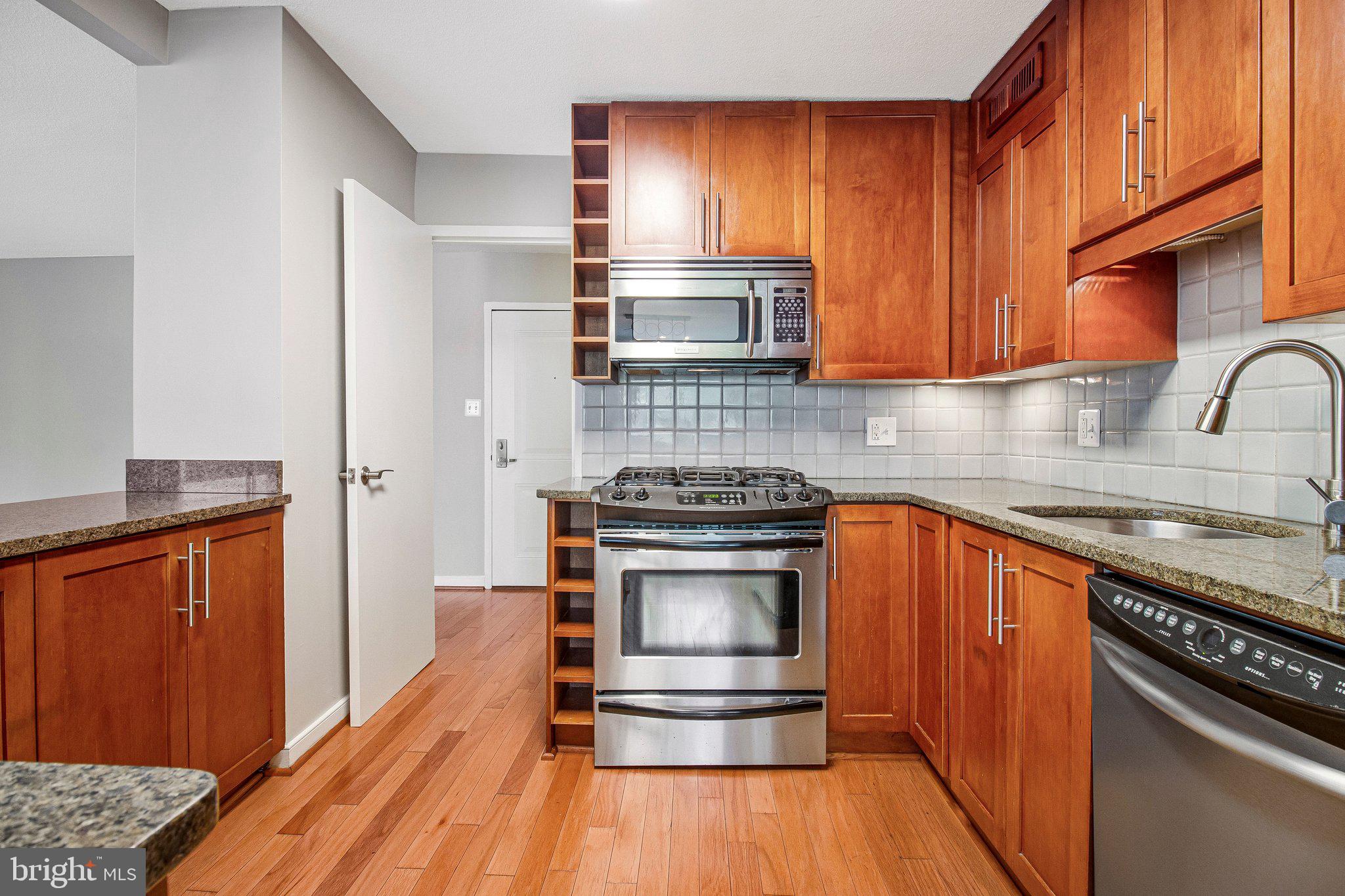 Your Next Home in the Heart of Takoma Park

Step inside and your eye goes straight to the balcony door, framed in the green of mature shade trees. The balcony faces north, so it stays cool through the summer, and it looks out over the community garden below — a quiet, leafy view that's hard to find this close to everything.

This spacious 1-bedroom, 1-bath condo offers 980 square feet of bright, open living space, freshly painted throughout, with beautiful hardwood floors in the living areas and brand-new carpet in the primary bedroom. The layout gives you room to relax and entertain,  in-unit laundry room,  air conditioning, and a premium assigned parking space (just outside the rear mail room door) take care of the everyday essentials.

The building itself is full of resort-style amenities: a swimming pool, tennis court, BBQ area, courtyard and garden spaces, a bike room, community laundry, fenced in doggy area, extra storage, and secure entry with elevator service. And the monthly condo fee covers all utilities and pool membership, so day-to-day costs stay simple and predictable.

Shopping, dining, and transportation are all just moments away, making this a truly easy, comfortable high-rise home.

Come see it for yourself — this one won't last long.