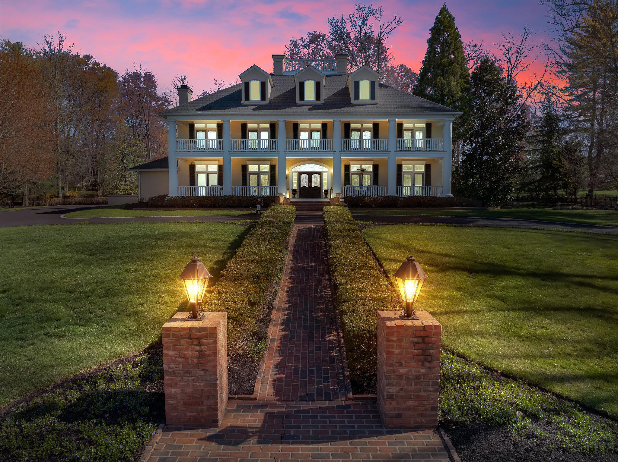 Sweet Home Gwynedd Valley! Welcome to the truly one-of-a- kind 950 Pennbrooke Lane. This exquisite southern inspired manor home offers an unparalleled blend of luxury and comfort on one of Gwynedd Valley's most coveted streets. The home was a custom design that was built in 2000 by Philomeno & Salamone for the current owners. Spanning over 2.2 acres includes the adjacent lot in the sale.  Step inside to discover a meticulously designed interior with four floors of living space that features six spacious bedrooms and four full bathrooms, complemented by two elegant half baths. The downstairs has an open floor plan that is adorned with crown moldings, hardwood floors throughout, custom built-ins, wainscoting, and a cozy gas fireplace in the kitchen eating area perfect for gatherings. The gourmet kitchen is equipped with high-end appliances, including a built-in range, wall oven, two dishwasher, subzero fridges and flows seamlessly into the dining area that is ideal for entertaining. Outside, enjoy multiple balconies that includes a two-story front porch that overlooks the circular driveway, an enormous back patio with extensive hardscape, more covered porches, and lush landscaping. The three-car side-entry garage provides ample storage with a built in EV charger. Experience the exclusive lifestyle this remarkable home offers, where luxury meets everyday living.