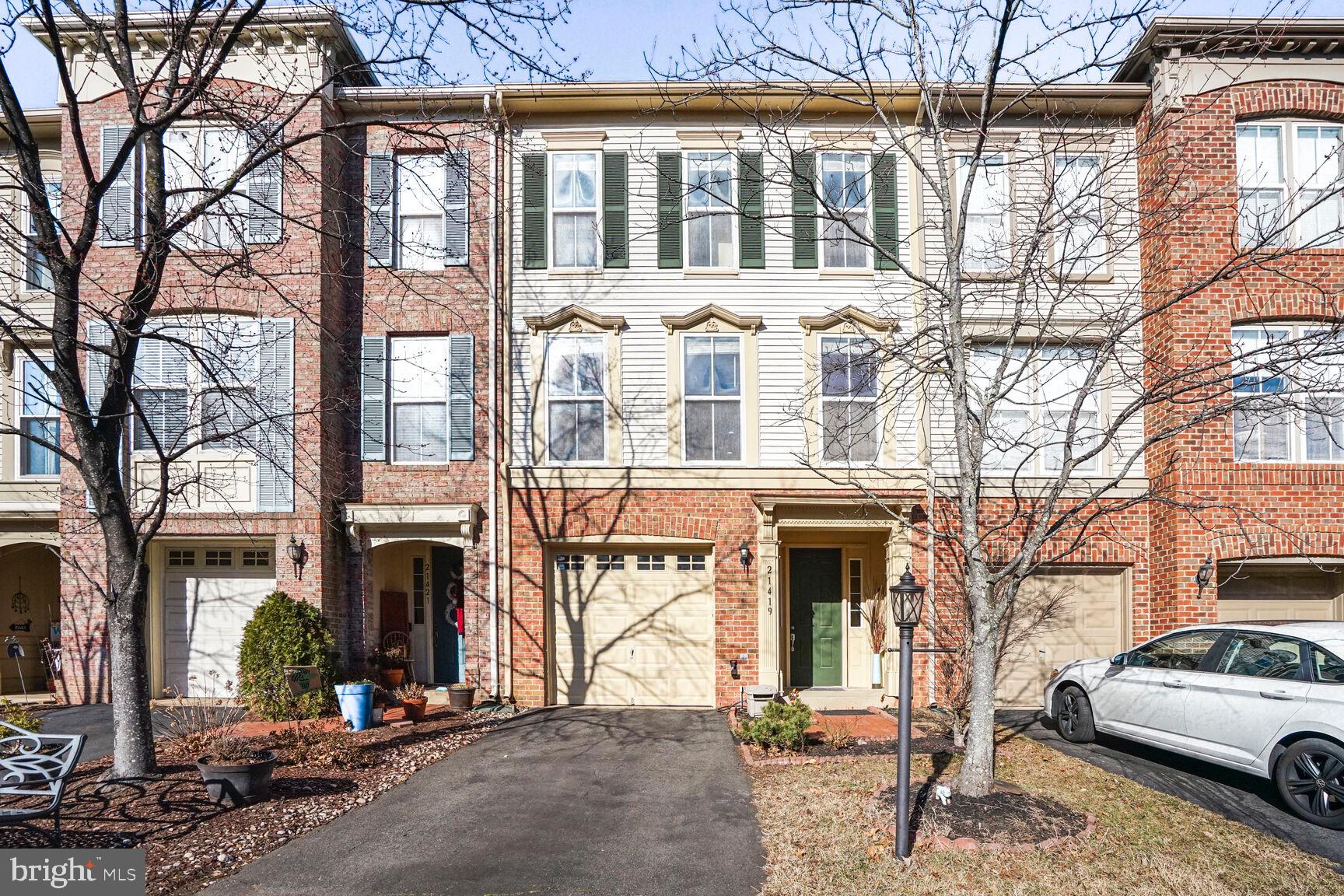 Stunning East-Facing 3-Bedroom, 2.5-Bath Townhome with 1-Car Garage in Highly Desirable Broadlands!
Freshly painted and hardwood floors through out, Recently updated, and move-in ready, this spacious 2,229 sq. ft. home features a gourmet kitchen with updated appliances, an island, and a side buffet with extra cabinetry. The separate dining room and expansive living room, a gas fireplace, and sliding doors leading to a private deck overlooking serene trees.
The upper-level primary suite offers oversized his-and-hers closets and a luxurious bathroom. Two additional bedrooms share an upgraded full bath. The entry-level recreation room with ceramic tiles, includes sliding doors leading to a patio and a fenced-in backyard.
Conveniently located just 0.5 miles from the 267 Greenway and approximately 3 miles from the Silver Line Metro. Nearby, you'll find grocery stores, fitness centers, and restaurants, all surrounded by scenic lakes and picturesque walking trails!
AC and compressor installed summer 2021 New hardwood in bedroom level 1/14/2022
Roof 2017-2018 Dishwasher October 2021 Refrigerator 2019 Disposal 2019