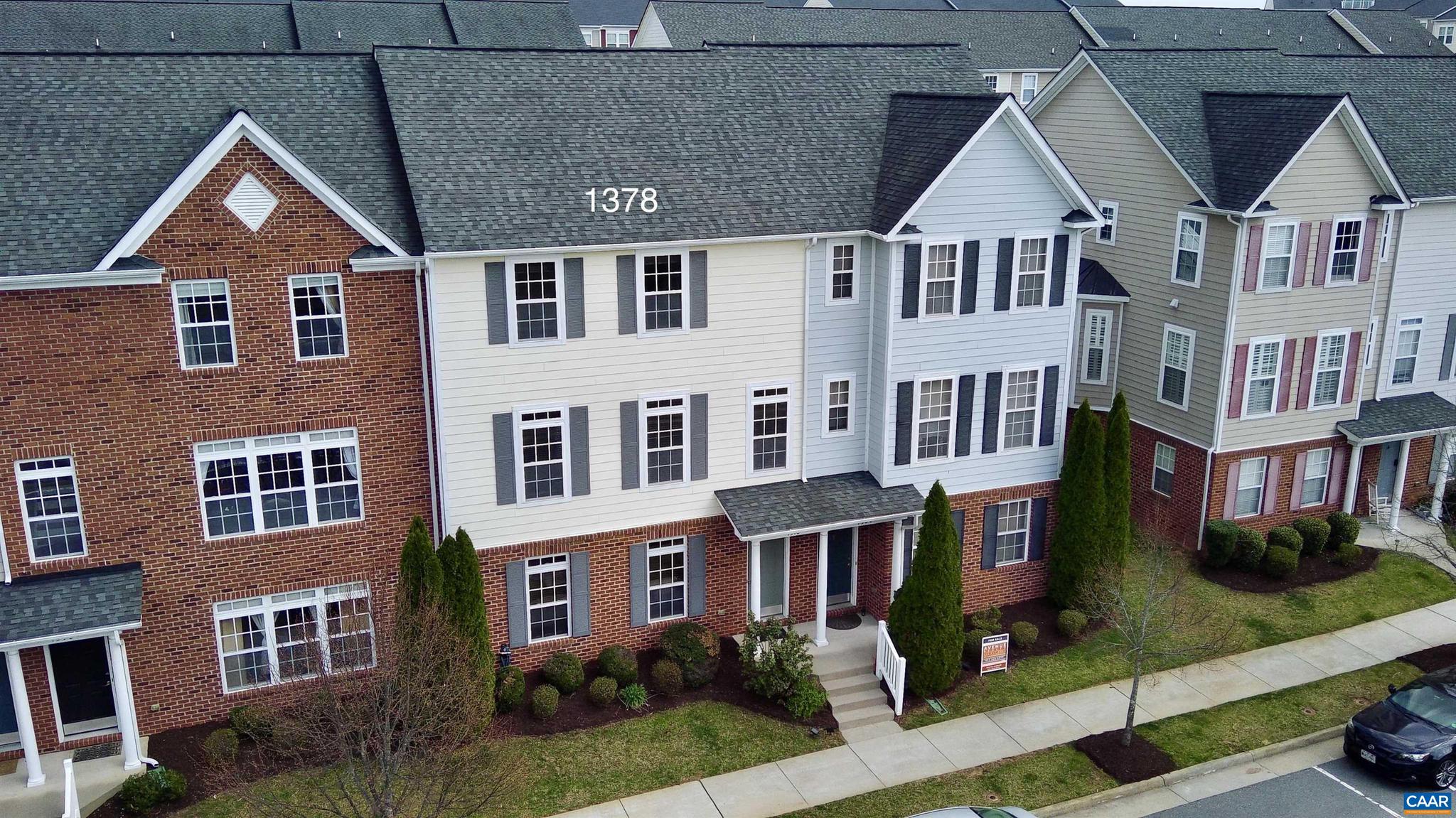 Beautifully upgraded townhouse in desirable North Albemarle just minutes from shopping, NGIC, DIA, AstraZeneca and Airport offering exceptional value in a prime location! Freshly painted in neutral tones with new carpet and LVP, this light-filled home welcomes you on the main level with gleaming hardwood floors, a spacious living room, and an entertainer?s kitchen featuring a built-in wine cabinet and mini fridge. A convenient half bath and laundry area with stackable unit complete this level. Upstairs, the generous primary suite boasts a walk-in closet and private en-suite bath with a walk-in shower. All bedrooms and living spaces include ceiling fans and have been recently refreshed with paint. The finished walk-out basement adds incredible flexibility with an oversized fourth bedroom or family room, large windows for natural light, a full bathroom, and ample storage space. This move-in ready home combines comfort, style, and convenience?don?t miss this opportunity!,Solid Surface Counter,Wood Cabinets