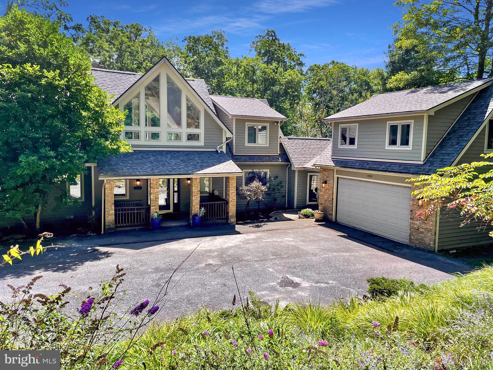 Amazing opportunity to own your dream 4500+ sq ft Deep Creek. MD lakefront home nestled at the end of quiet Sandy Shores Road and on a RARE 1.5+ acres close to everything this year-round resort destination has to offer & only 2 hours from the Pittsburgh or Washington, D.C. areas!  This tastefully & fully furnished luxury get-away features 5 spacious bedrooms-ALL with lakefront views & each with its own full bath plus a main floor master suite with a fireplace!  Multiple areas inside & out for entertaining family & friends plus a hot tub, 3 fireplaces & BONUS space above the detached 2-car garage plumbed for an additional bath that you can finish for a guest suite, kids zone or additional rental income!  You just can't beat this location close to everything Deep Creek resort has to offer including nearby 18 hole Lodestone Golf Course, Adventure Sports Center International and located on the deepest part of the lake with a Type A dock included that can house up to 3 boats!  In the winter months enjoy skiing and more snow fun at Wisp Resort!  Property is currently on Red Barn vacation rental program and the owners have been very happy with their management!  1 year AHS Shield Complete home warranty included.  By private appointment only when property is not being rented.  Don't miss this one!