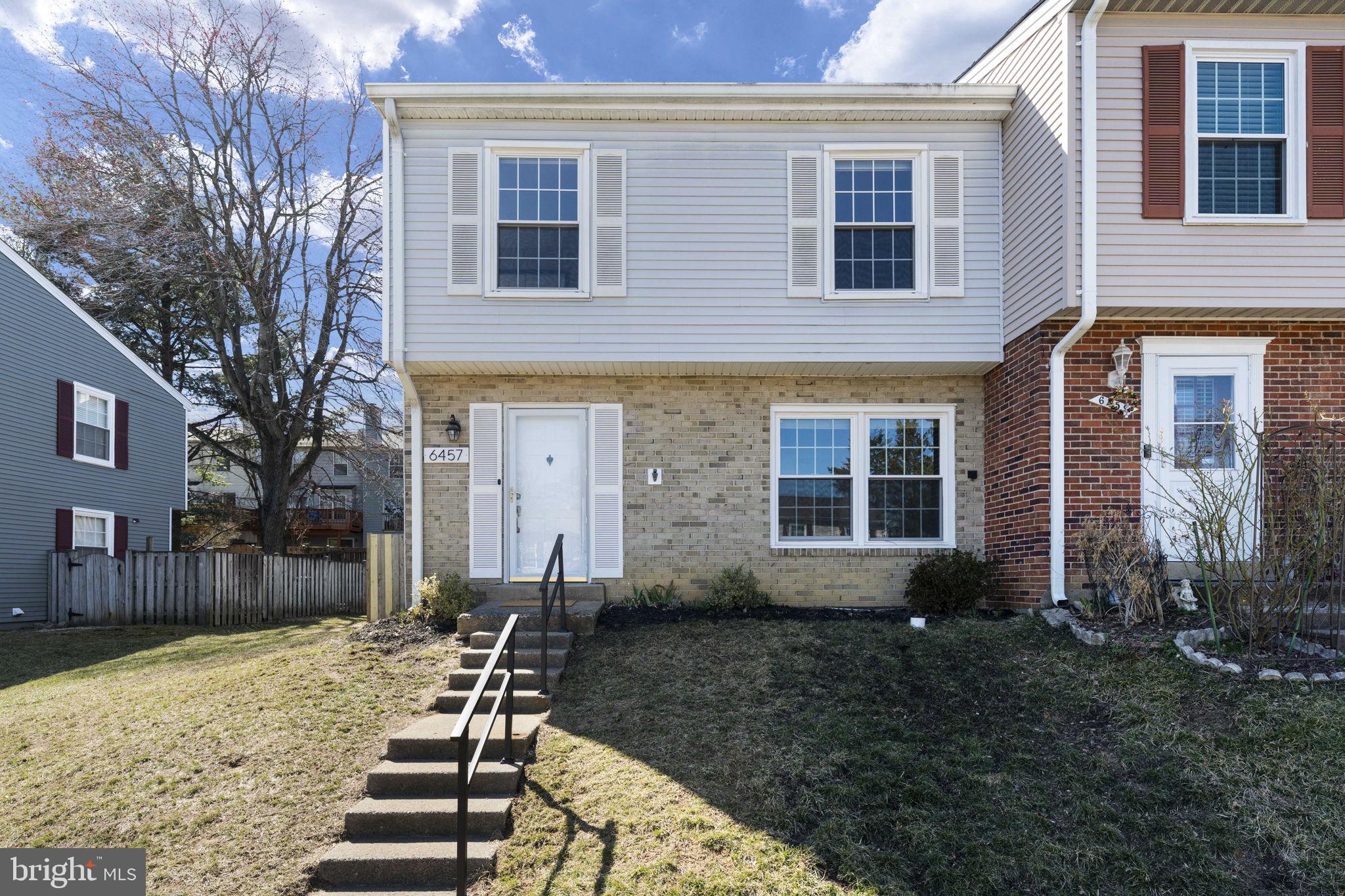 This spacious 4-bedroom, 2.5-bath end-unit townhome offers 2,350 sq. ft. of living space in the highly sought-after Windsor Park neighborhood. The main level features gleaming hardwood floors, recessed lighting and an upgraded kitchen with stainless steel appliances, wood cabinetry, a pantry, and a breakfast area. The formal dining room is perfect for entertaining. Upstairs, you'll find three bedrooms, including a luxurious primary suite with a sitting area, two closets, and plenty of natural light. The updated en-suite bath (2023) boasts a modern vanity, porcelain tile, a marble-tiled shower floor, rainfall showerhead, and dimmable recessed lighting. The fully remodeled hall bath (2024), features custom herringbone tile, porcelain flooring, and a rainfall showerhead. The renovated lower level offers additional living space with a large family room, an under-stair desk area, a fourth bedroom with two walk-in closets, and a laundry room with ample cabinetry. The fully fenced backyard features a newly paver patio (2024) ideal for outdoor entertaining. Located close to the Franconia-Springfield Metro and Springfield Town Center, this home offers convenience and style in a prime Alexandria location!
