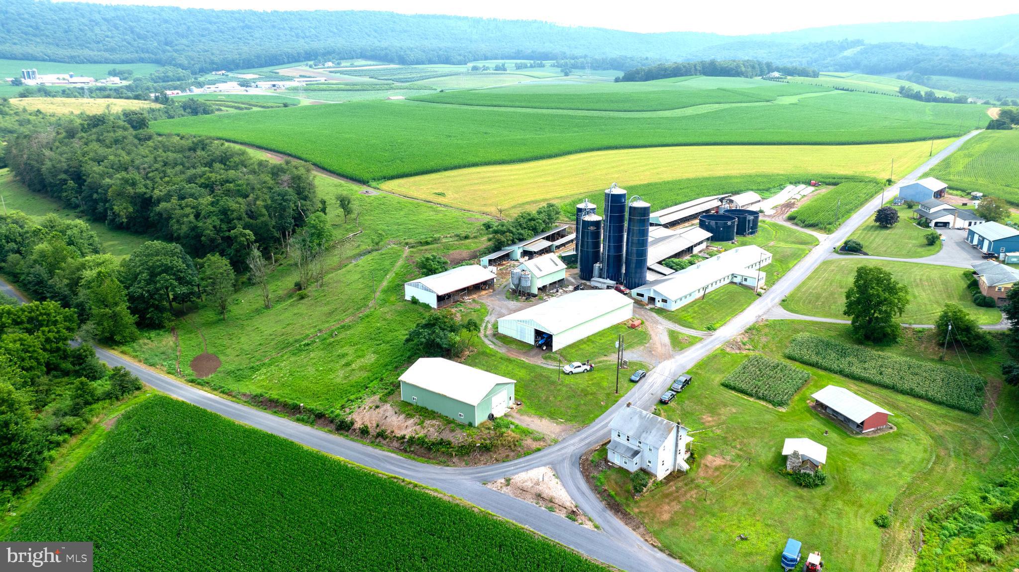 118 +/- Acre Farm with dairy setup and 2 homes._-----
Aprox.103 Acres tillable & 15 acres pasture. ----- Great soils and well drained land. ____
 Farm is Preserved with Schuylkill County Land Preservation easement.____
 Settlement is subject to final subdivision___ Seller Financing Available to Qualified Buyers____________
 Home #1 --- 3 bed, 1 bath home with well and septic -1800 built ---
Home #2 ----3 bed, 1.5 bath home with shared well and septic -1981 built---
Outbuildings :---
82 Stall Dairy Facility with Milker System, 18,000 lb. Milk Tank, Tunnel Ventilation, newer Cow Mattresses, & much more
 30x144 Virginia Style Cattle Barn
 50 stall Free-Stall barn with bed pack pen area
 40x60 Pole Barn /Shop
 56x120 Equipment Shed
 40x60 Commodity Shed with Steer Pen
 Virginia-style 8 bay heifer barn attached to calf hutch facility
 30x60 Hoop Barn
 33x50 2-story Bank Barn
 4 - Harvestore Silos
 2 - Slurry store - Manure Storage Silos - 48x23
 5 Grain bins