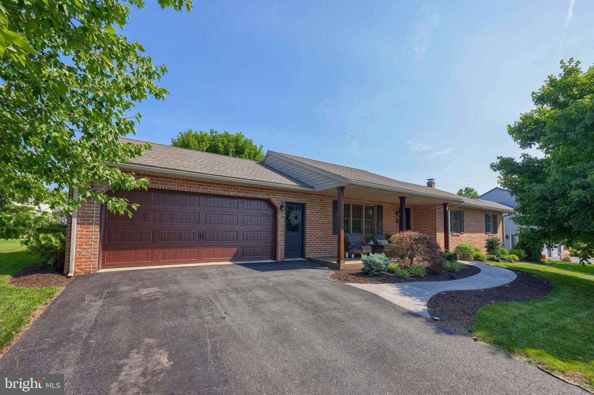 Absolutely stunning and thoughtfully designed, this multi-generational ranch home is a rare opportunity in Brecknock Township within the Eastern Lancaster County School District. Meticulously renovated by its current owners, every detail has been carefully considered to create a home that is as functional as it is beautiful.
The heart of the home is the stunning custom kitchen, featuring handcrafted cabinetry, a large center island, and rare quartzite countertops. Designed with both style and continuity in mind, the main-level kitchen, lower-level kitchen, and all three bathrooms were custom-built by the same cabinet maker, creating a cohesive design throughout the home.
The main level offers a spacious living room, generous dining area, and a bright, airy office or den, along with three comfortable bedrooms, each featuring true hardwood flooring. Two beautifully appointed bathrooms showcase elegant herringbone tile. Off the kitchen, car enthusiasts or hobbyists will love the special oversized two car garage with finished walls, high quality insulated garage door and ductless mini split system to offer its own heating and cooling.   
The finished lower level is equally impressive and offers exceptional flexibility. Perfect as an in-law suite, private guest quarters, or living space for an older child or extended family member, this private apartment includes a full custom kitchen, open dining area, comfortable living room, pantry, spacious bedroom with a walk-in closet, and a full bathroom. A separate fitness room completes the lower level, providing even more functional living space.
Additional upgrades provide peace of mind, including a newer roof (2023), water heater (2024), and HVAC system (2018). 
Outside, professional landscaping surrounds the entire property, creating exceptional curb appeal. Relax on the inviting front porch or entertain family and friends on the rear patio featuring a built-in fire pit. The spacious backyard, shaded by mature trees, offers plenty of room for gatherings, recreation, or simply enjoying the peaceful surroundings.
Lovingly maintained and impeccably updated, this truly move-in-ready home combines quality craftsmanship, thoughtful design, and versatile living spaces rarely found in today's market. Now it's ready to welcome its next family.
Schedule your private showing today and experience everything 84 Clover Drive has to offer!