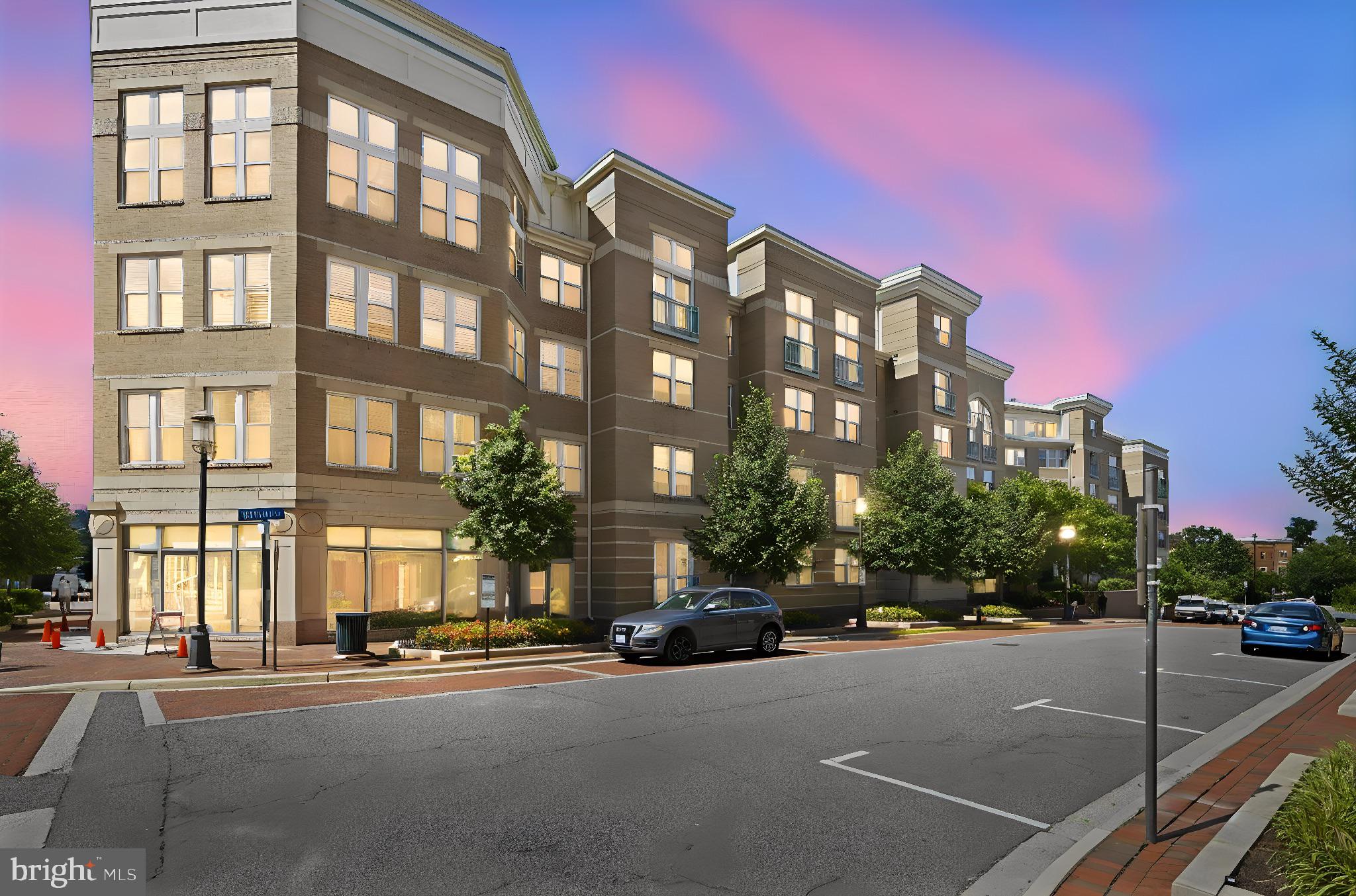 Be sure to check out the virtual tour! Rarely available and exquisitely updated, this stunning top-floor, two-level penthouse condo in the highly sought-after Market Street at Town Center offers the perfect blend of luxury, comfort, and convenience in the heart of Reston Town Center. Filled with natural light and showcasing soaring cathedral ceilings, this spacious residence features an open, airy layout designed for effortless everyday living and elegant entertaining.

Updated in 2023 with stylish modern finishes throughout, the home offers two generously sized primary suites, 2.5 bathrooms, and an abundance of thoughtfully designed living space. The welcoming foyer features ceramic tile flooring and a coat closet, opening into the expansive main living area where a dramatic vaulted ceiling, brand new LVP flooring (installation in progress and new photos will be uploaded accordingly), gas fireplace with tile surround, and a wall of windows with French doors create an impressive yet inviting atmosphere. A charming reading nook or office space tucked beneath the stairs adds warmth and versatility.

The beautifully upgraded kitchen is both functional and sophisticated, appointed with quartz countertops, GE stainless steel appliances, and a center island ideal for casual dining, meal preparation, or gathering with guests. A stylishly renovated powder room and a separate laundry/utility room with full-size washer and dryer provide convenience and practicality.

Both primary suites offer exceptional privacy and comfort and brand new carpeting. The main-level suite features two closets, including a walk-in, along with a spacious en-suite bath. The upper-level suite also includes a walk-in closet and private en-suite bathroom, creating the perfect retreat for guests, family members, or flexible living arrangements.

Residents of Market Street at Town Center enjoy an impressive array of resort-style amenities, including a newly renovated club room with lounge, bar, billiards, and air hockey, a media and computer room, a fitness center, concierge service, a beautifully landscaped courtyard, and a spectacular two-tier outdoor pool. The building interior was refreshed in 2023 with new paint, carpet, and modern fixtures, further elevating the community’s appeal.

Ideally located within an excellent Fairfax County school pyramid, this home offers unparalleled access to the best of Reston living. Just steps from the upscale shopping, dining, and entertainment of Reston Town Center and RTC West, and moments from Reston Hospital Center, the location combines vibrant urban convenience with a peaceful residential setting. Outdoor enthusiasts will appreciate direct access to the scenic Washington and Old Dominion Railroad Regional Park Trail, nearby parks, and green spaces.
Commuters will love the easy access to the Dulles Toll Road, Reston Parkway, Fairfax County Parkway, and the Silver Line Metro stations at Reston Town Center station and Wiehle–Reston East station, all just minutes away.

Offering the ultimate in urban-style luxury living, this exceptional penthouse residence is a rare opportunity to own one of Market Street’s most desirable floor plans in one of Reston’s premier locations.