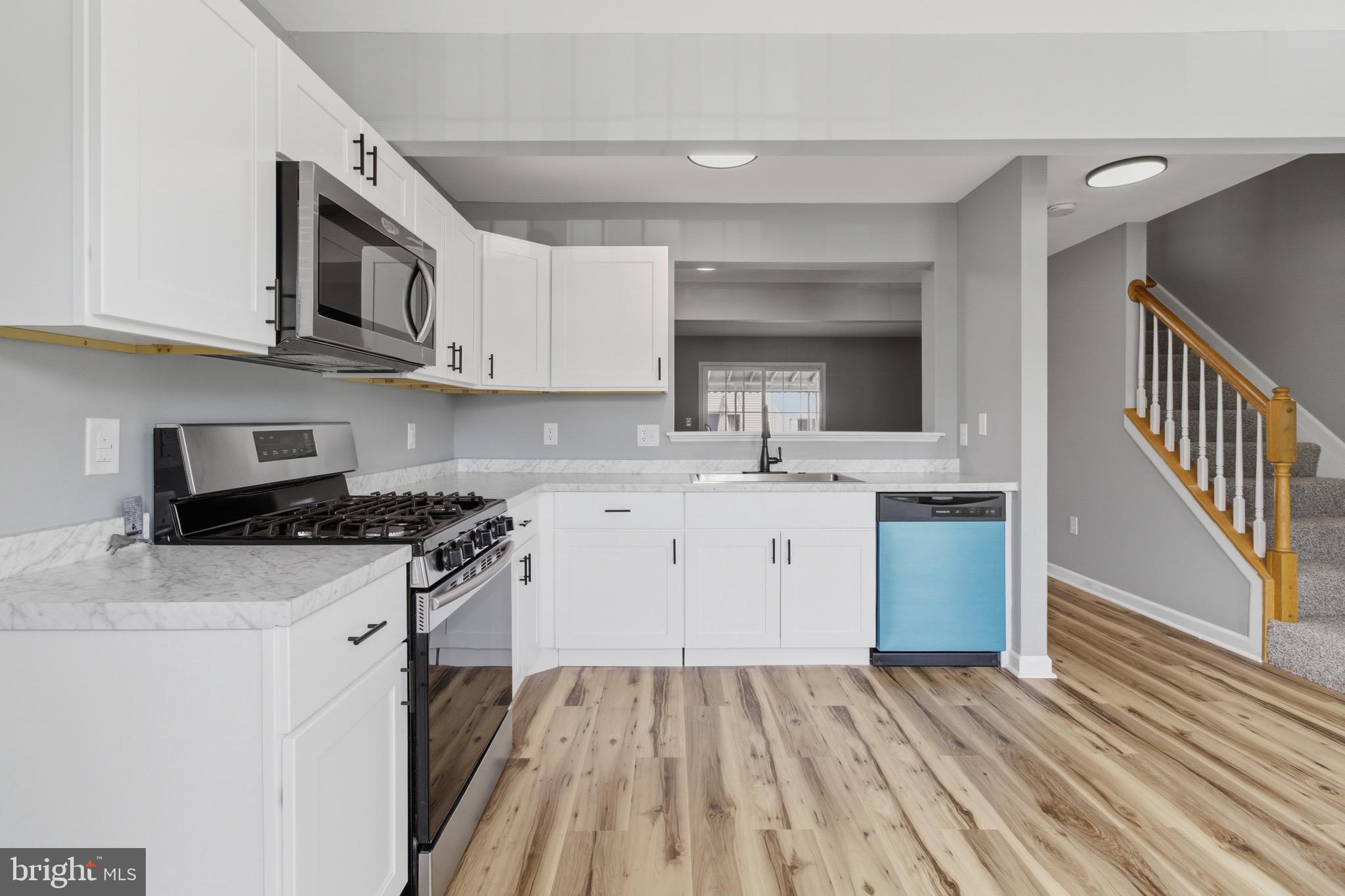 Updated 4-bedroom townhome with NO HOA in Greenbriar at White Marsh! Enjoy an open floor plan, updated kitchen and baths, covered deck, and rough-in plumbing offering potential for a future 3rd bathroom. HVAC system installed in 2019, roof replaced approximately 7 years ago.  **Sellers are offering closing cost assistance with acceptable offer.**

Enjoy outdoor living on the covered deck or patio and backyard, complete with a storage shed for added convenience. 

Conveniently located near shopping, parks, dining, and entertainment, this move-in-ready home combines comfort, value, and an ideal location. Schedule your showing today!