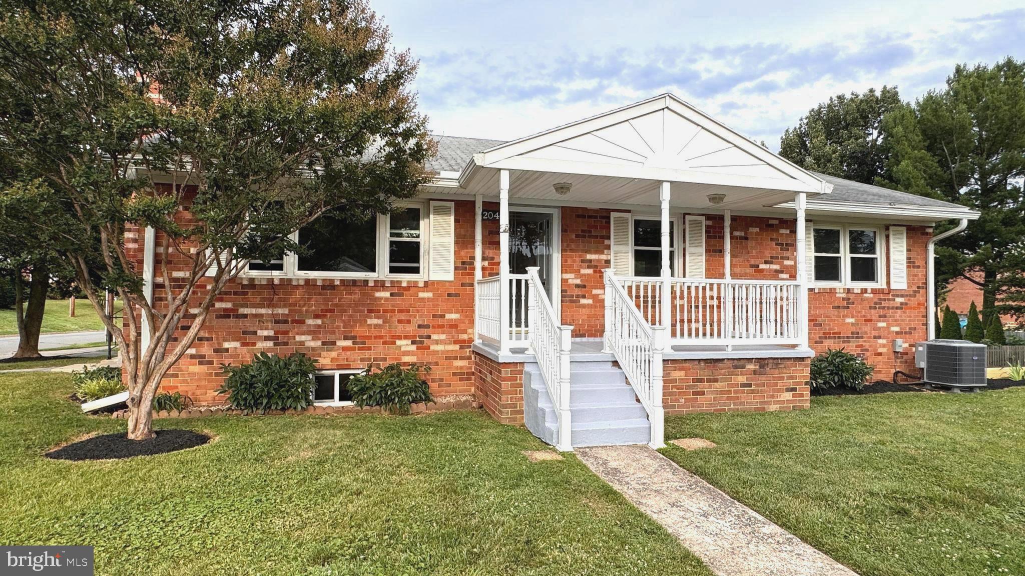 PRICED TO SELL! Great opportunity to own this fantastic all brick home on a quarter acre corner lot, in an established community with no HOA and where homes are rarely for sale. Located in the heart of downtown Leesburg within walking distance to the historic district with local shops, dining, community events, as well as the Ida Lee Park Recreation Center and Rust Library, and easy access to numerous commuter routes. The welcoming front porch invites you into a spacious, freshly painted home with gorgeous hardwood floors flowing throughout the main level with 3 bedrooms and 2 full bathrooms.  The living room has a huge picture window for natural light and built-in shelves surrounding the gas fireplace with glass doors. The dining room, also with a huge picture window, includes chair molding, built-in cabinets and a ceiling fan. The kitchen, with new LVP flooring, includes double sinks, side by side fridge with ice/water dispenser, built in microwave, dishwasher and stove with preferred gas cooking. On the same level, the home boasts 3 generously sized bedrooms, all with cedar lined closets and ceiling fans, with an en-suite bathroom for the primary bedroom.  The lower level has a huge family room with a cozy wood burning fireplace and brand new carpeting, plus 2 bonus rooms with lots of potential to use as you see fit, with an abundance of storage room, a half bath, and also a utility sink. Outside you'll find a tastefully landscaped yard and plenty of parking for your family and friends, with the driveway desending behind the home with a lower level parking area and garage. Home has been updated with a new HVAC installed in 2022, providing central heat and AC. The detached outdoor shed has electricity and an exterior charging station next to the concrete pad. Hurry, don’t miss this chance to own a great home in one of Leesburg’s most desirable locations. Property is offered as-is.