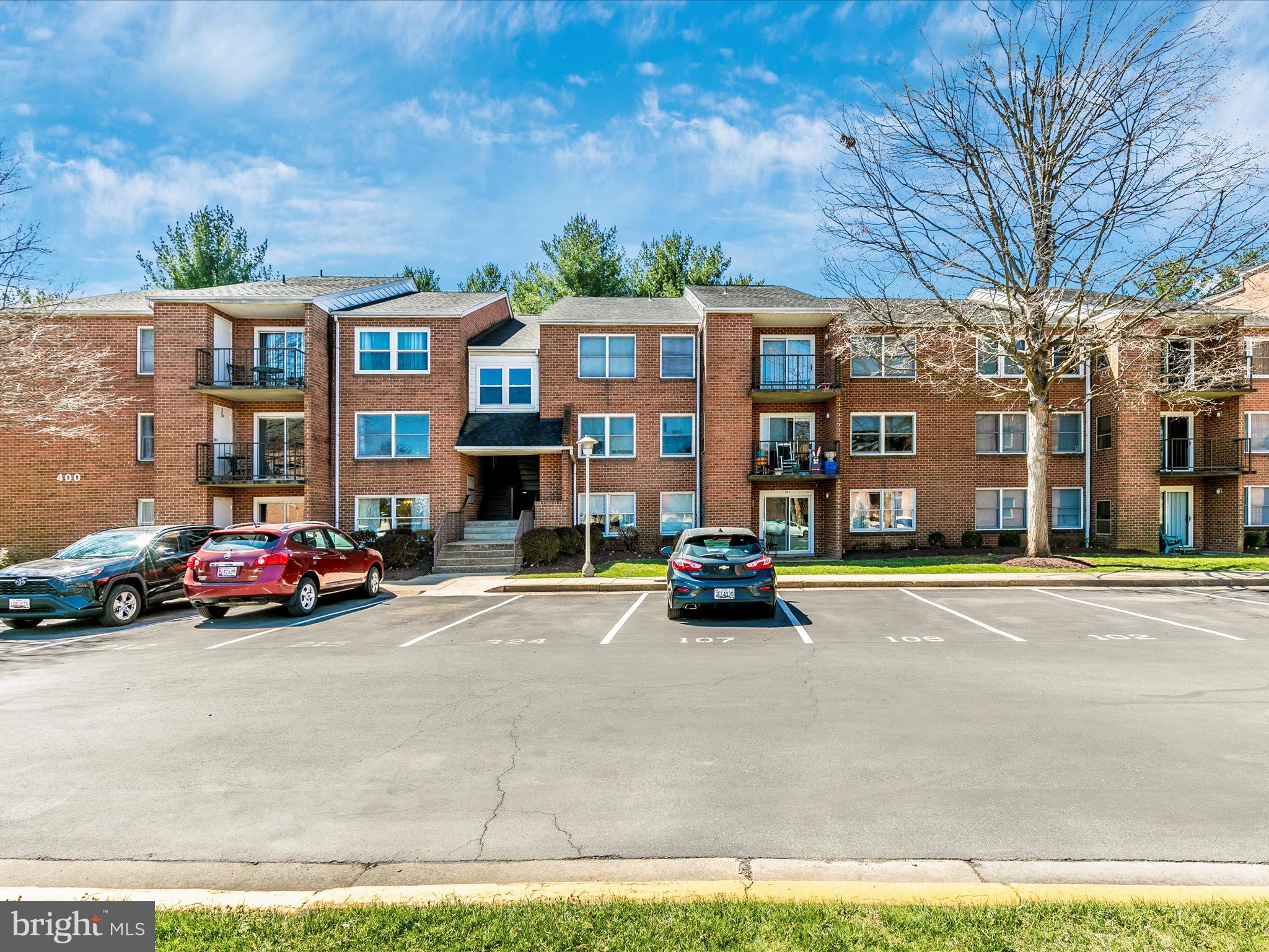 Discover the convenience of true main-level living in this spacious, light-filled corner condo at 400 Chapel Ct in Walkersville, MD. Situated on the first floor, this home features a patio door leading to a private patio, with direct access across the lawn to your assigned parking space right out front and visitor parking close by. Inside, you'll find an inviting foyer with a large coat closet that opens into a generous living room, dining area, and a well-appointed galley kitchen with a charming breakfast nook. Large windows throughout the unit provide abundant natural light, while the two bedrooms offer peaceful views of the surrounding green space. The primary bedroom boasts a private half bath and a walk-in closet, while the secondary bedroom is conveniently located near the full hall bath. Additional features include a laundry/utility room, a linen closet, and a spacious storage closet in the hallway. Enjoy outdoor living on the patio, complete with a utility closet, plus an extra secure storage area on the main level of the building.  Nestled in the heart of Walkersville, this home offers the charm of small-town living with easy access to Route 26, Route 15, and downtown Frederick—placing shopping, dining, and entertainment just minutes away. Don't miss this fantastic opportunity!