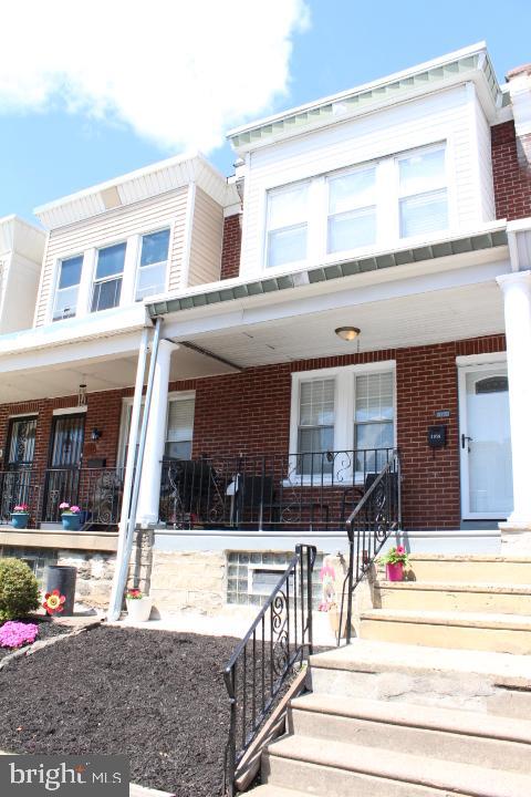 Wow! Take a look at this beautiful two story straight thru row home located in the Lawncrest Section of Northeast Philadelphia.  This home is absolutely Gorgeous!!! As walk up to the front of this property you will notice the nice and beautiful carb appeal with a nice sized front yard area and an awesome sized porch that is good for sitting outside on those nice sunny days.  The 1st floor features a nice spacious living room & dining room with beautiful newer floors, nice paint colors and nice recess lighting and awesome ceiling fans.  There is awesome sized newer kitchen that features nice newer flooring, recess lighting, deep stainless-steel sink, garbage disposal, awesome counter tops with beautiful back splash, spacious cabinet & counter space and an awesome microwave & ceiling fan and a newer stove, dishwasher & refrigerator.  As you walk up to the 2nd floor you will notice the nice newer carpet on the steps and the spacious hallway with nice newer floors.  The 2nd floor features 3 awesome size bedrooms with an updated full hall bathroom. The master bedroom is Large with a good size closet & beautiful newer floors, paint, doors and a nice ceiling fan.  The middle bedroom is a good size with good closet space, beautiful newer floors, paint, doors and a nice ceiling fan. The back bedroom is an awesome size with good size closet space & beautiful newer floors, paint, doors and a nice ceiling fan as well. The full hall bathroom was renovated in 9/2020.  This awesome bathroom is nice and clean and features a newer skylight, beautiful tiled shower/tub area & floors, nice newer vanity and an awesome dual flush toilet and a nice size mirror.  There is a nice sized newly renovated finished basement that could be used as a fourth bedroom, office or a family room.  And it features a nice laundry area with a nice size utility sink, Utility room and etc.  And this basement also has access to the newer back door that will lead you to the back of the property where you will see the newer stucco and newer down spout.  And to top it off, the washer & dryer is included with this property and its approximately 1 year old.  This property has been well maintained through-out and also features a newer main roof & front porch roof, front & back down spouts and a bathroom Skylight as of 2/15/2022. Updated Plumbing, Updated Electrical, Newer rear stucco as of 4/5/2022.  There is a newer front screen door, main front door & back door. The main heating system has been recently serviced on 4/18/2022 by Meenan heating company, And the property has been freshly painted throughout. There is an awesome security alarm system that can be transferrable to the new homeowner with a small monthly cost.  And the Buyer can get their own heating contract with the same company if they like.  So as you can see this home has been very well kept & cared for. You will have to see this home to appreciate. This home is a great buy and as a new homeowner YOU will enjoy your new home and all of the features of this home.  It's within walking distance to Shopping, transportation and much more. This home is a Must See. Just pack your bags and move right in. So schedule your appointment Today!
