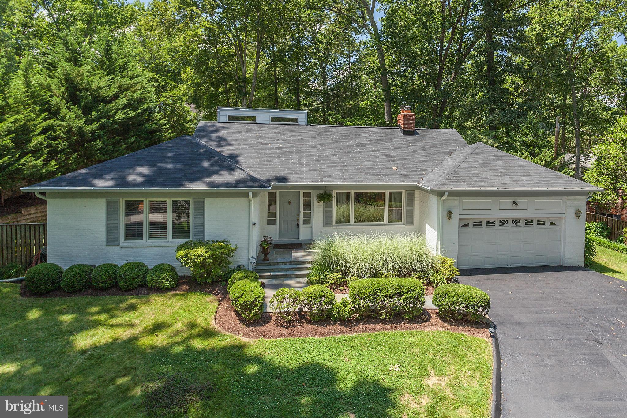 Charming cape w open floor plan, stunning fam rm addition w cathedral ceiling & lots of light! Hardwood flrs, elegant liv & din rms, kit w granite open to fam rm. Main lvl BR wing w gorgeous master ste w french doors to rear patio, sumptuous BA & W/I closet plus addl bedroom w handsome en suite BA. 3rd BR up w renov en suite BA & W/I attic storage. Slate patio & fab lndscpd yd