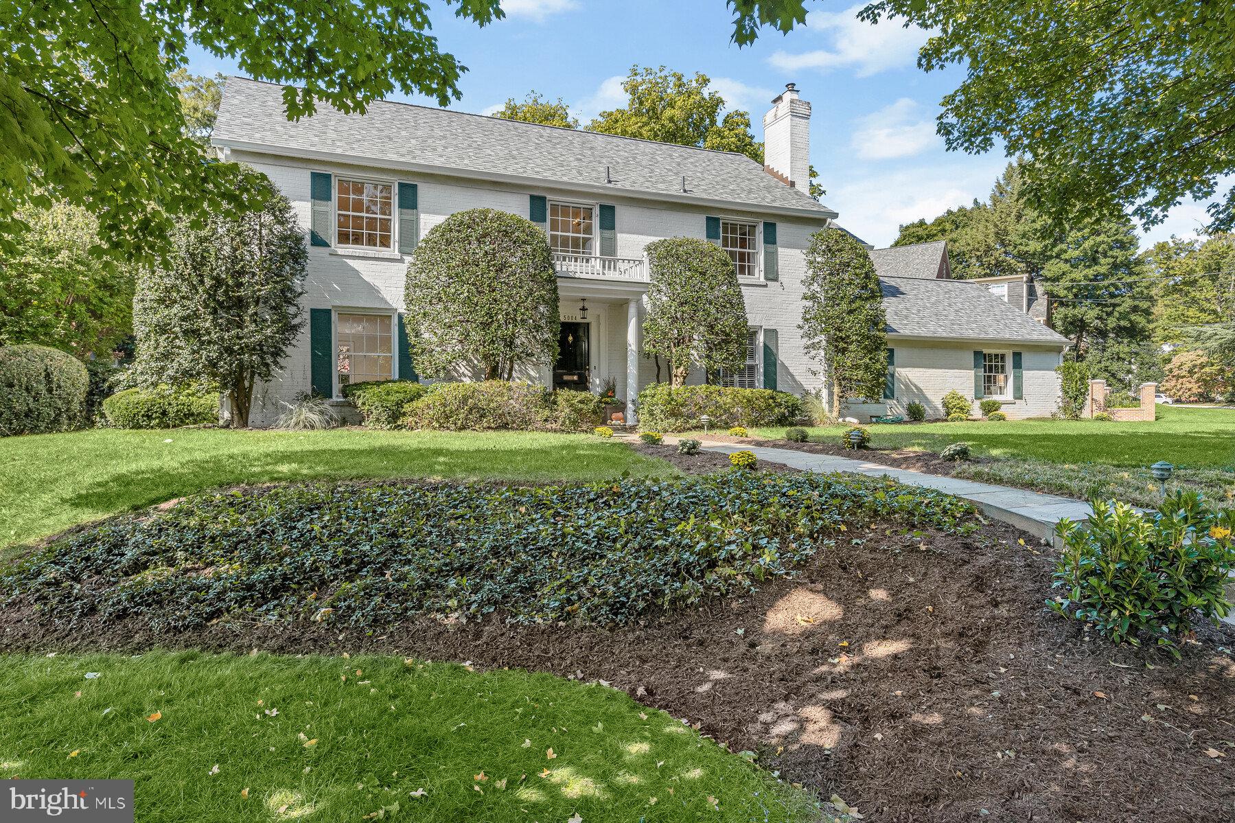 Welcome to 5004 Overlea Court! This home is ideally located in a quiet and charming cul-de-sac in Sumner, one of the most desirable close-in neighborhoods of Bethesda. This classic center hall Colonial offers over 4000 square feet of interior space. The main level features an inviting open plan concept with beautiful hardwood floors throughout. The inviting formal rooms are sunlit and spacious, offering the ideal entertaining and gathering space. The gourmet eat-in kitchen features an island with breakfast bar seating, ample cabinetry and storage, attractive counters, custom backsplash, and is fully equipped with a cooktop, wall ovens, SubZero refrigerator, and more. The spacious first-floor laundry room off the kitchen makes for ideal modern living. The upper level features an expanded primary suite with large walk-in closets and two separate bathrooms, with access to the private, sun-drenched office space. Three additional generously sized bedrooms complete this level, two of which offer access to a large balcony providing an opportunity for spectacular elevated outdoor space. The home has been recently painted, and a new roof was installed in 2019. The spacious flat backyard showcases a large flagstone patio and beautiful landscaping on nearly a 1/3 of an acre lot. A fully fenced-in backyard means pets and children aren't too far out of sight. Located a few blocks from The Shops at Sumner Place and steps from the Capital Crescent trail, the location of this house a dream!