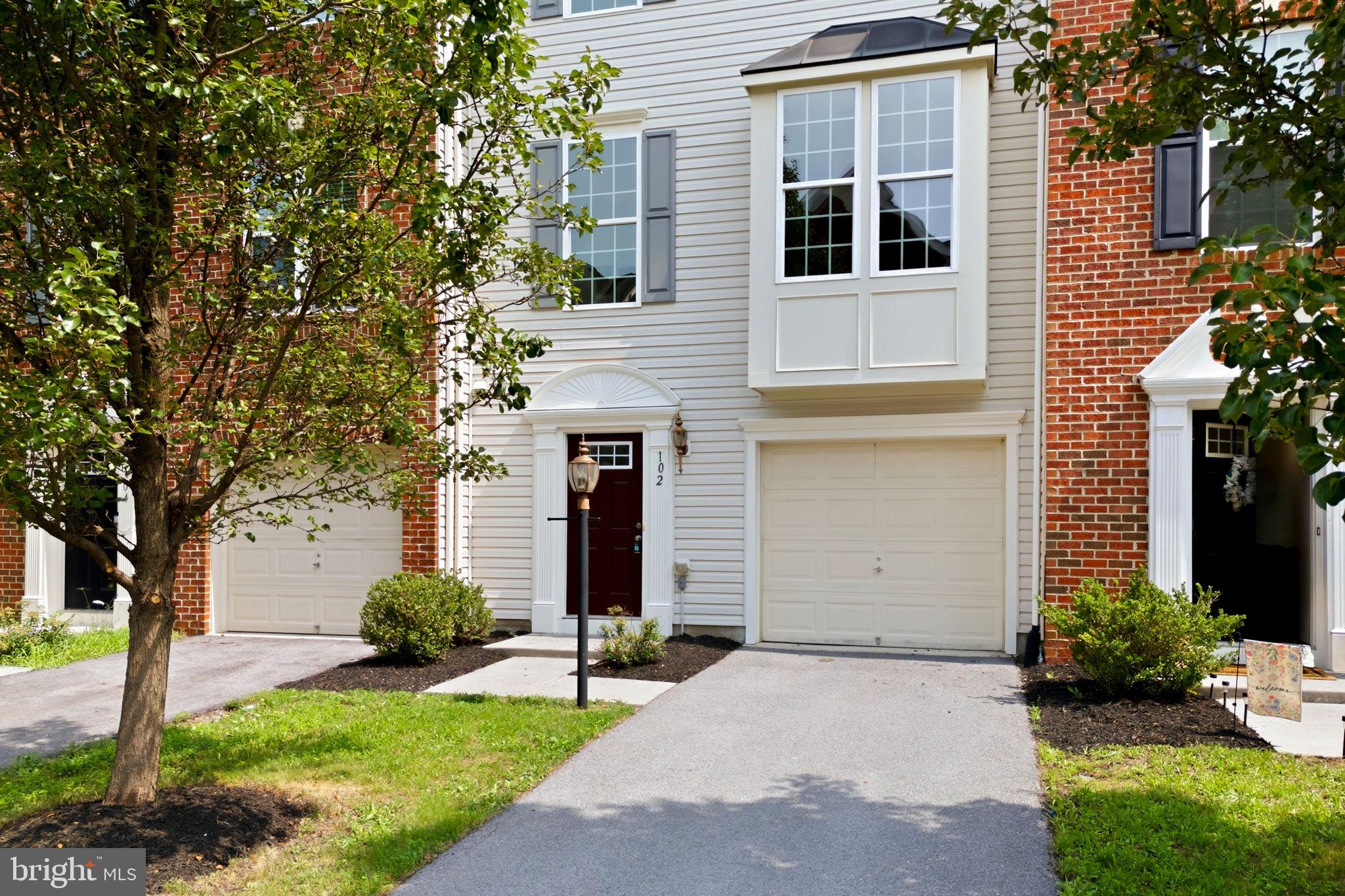 Welcome home to 102 Argyle in Diamond Valley at Snowden Bridge! This beautifully refreshed interior townhouse is truly turnkey and ready for you to move right in. Offering more than 2,300 square feet across three finished levels, this spacious home features three bedrooms, two full baths, and one half bath.

The main level welcomes you with polished, genuine hardwood floors and an open, inviting layout. The gourmet kitchen features granite countertops, stainless steel appliances, a center island, and plenty of workspace, all adjacent to a generous dining area. A sliding glass door leads to the newly refreshed Trex deck with decorative railings—perfect for relaxing, entertaining, or enjoying your morning coffee.

Upstairs, the generously sized owner's suite offers a walk-in closet and a luxurious private bath complete with a jetted soaking tub, separate shower, and double vanities. Two additional bedrooms, a full hall bath, and conveniently located upper-level laundry complete this floor.

The walk-out lower level provides even more living space with a large recreation room featuring a modern corner gas fireplace, a convenient half bath, and direct access to the backyard. A central vacuum system adds everyday convenience throughout the home.

Recent updates include fresh paint, new carpeting, updated lighting, select new fixtures, and a refreshed Trex deck. With over 2,300 finished square feet, thoughtful upgrades, and true move-in-ready condition, this home offers an outstanding opportunity to enjoy more home, more features, and exceptional value in one of the area's most sought-after communities.

Residents of Snowden Bridge enjoy an impressive collection of resort-style amenities, including a community pool, indoor sports complex, pirate-themed splash park, playgrounds, walking trails, dog park, picnic areas, and more—all just minutes from shopping, dining, schools, and commuter routes. Don't miss your opportunity to own this beautifully updated home that delivers incredible value without compromising on space, comfort, or amenities.