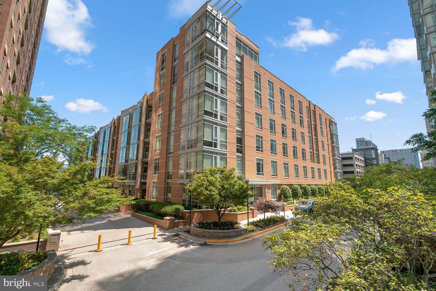 Experience luxury living in this sleek and contemporary 2-bedroom, 2-bathroom condo in the highly sought-after Midtown North, located in the heart of Reston Town Center. Designed for modern living, this stunning residence features floor-to-ceiling windows, soaring 11' ceilings, and wide-plank flooring, creating an open and airy atmosphere.

The gourmet kitchen showcases high-end finishes and sleek stainless steel appliances, making it perfect for entertaining. The expansive primary suite features a spa-like ensuite bath, a generous walk-in closet, and a private balcony—a serene space to start or end your day. The versatile second bedroom offers the perfect space for guests or a home office.

Enjoy the convenience of two side-by-side garage parking spaces and a private storage unit. Midtown North’s amenities include a fitness center, rooftop terrace, and a resident’s lounge with surround sound for an elevated entertainment experience.

Located just steps from fine dining, shopping, entertainment, and the Silver Line Metro, this condo offers the best of urban convenience with the tranquility of a sophisticated retreat.