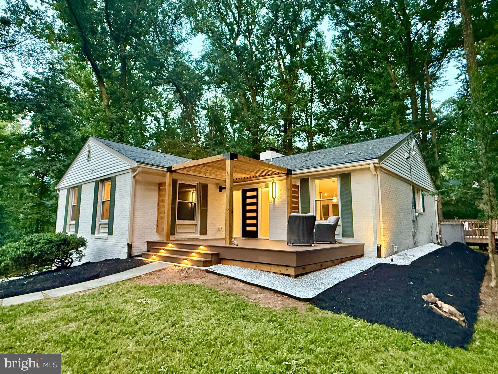 A spectacular newly renovated home, Welcome to Annamarie Court!  Ideally located in Central Montgomery County and sited on 1.3 acres, this home features two daylight levels of custom finished living space on a desirable cul-de-sac street!  Renovated down to the studs now an open floor plan, this designer home is the perfect combination of modern comforts fortified by timeless all brick construction!  Greeted by a Portico at the front entry, you are then welcomed into a spacious foyer that proudly displays the bright and seamless design of this house!  A Brand-new Gourmet Kitchen with Breakfast Island, profile appliances, and all the bells and whistles awaits you!  Modern living open to spacious dining room and living room areas that are abundant with natural daylight, all set on real hardwood floors with a mantled wood burning fireplace!   The main level continues to three spacious bedrooms, two custom tiled bathrooms both with double vanities; the primary bath has heated floors, a powder room bath, a laundry closet, and two designer hallway closets.  All closets have custom built-ins, all bedrooms have remote ceiling fans, and there is recessed lighting everywhere!  The lower daylight level features a versatile bedroom or office space with two closets and a custom tiled full bath.  A second downstairs laundry, storage space, and a bright family room with exposed painted brick that has access to the massive two car garage and walkout entry.  The exterior features a large private deck that is perfect for hosting large social gatherings or just relaxing in nature!  The front Portico also has a serene seating space for you to enjoy your privacy.  Exterior wired landscape lighting includes motion security lights and there is a large storage shed for your landscaping and yard toys!  New, new, new: electrical, plumbing, HVAC, flooring, drywall, lighting, exterior & interior finishes and fixtures, you name it! ***BONUS: This sale includes 5712 Annamarie court which is a second parcel of attached land that is zoned RE1 with building potential, or keep your own privacy, build a pool, extra driveway, or other amenities, for a total of 1.3 prime acres!  This estate is a true gem, come take a look today!
