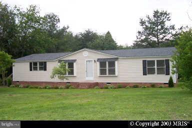 Looking for a one story home with Acreage...here it is.  This home is convenient to I95 and is on 2+ Acres.  Needs TLC, but is ready for your family.  3 Bedrooms and 2 baths, Rear Deck, Storage Shed, and more.  Subject to Third Party Approval
