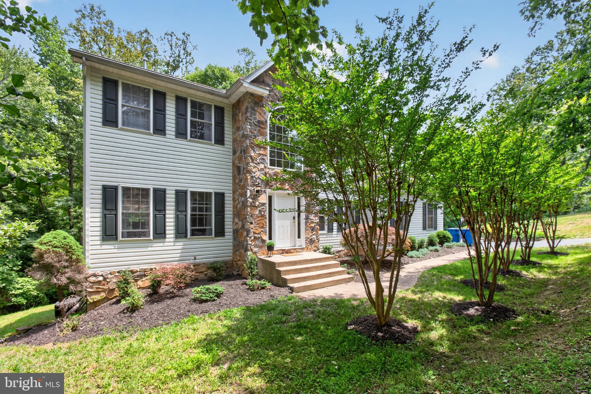Welcome to your private retreat on 3.4 acres of pure serenity! This stunning 5-bedroom, 3-bath home with a dedicated office on the main level offers the perfect blend of elegance, comfort, and convenience. Located less than 4 miles from the VRE, with commuter lots, schools, and everyday amenities just minutes away, this home provides easy access while still giving you the peace and privacy of acreage living.

Step inside to a light-filled main level featuring soaring ceilings, beautiful architectural columns, and updated flooring throughout. The gourmet kitchen is designed for entertaining and family. The gorgeous dining room with a bay window and the family room with elegant columns creates the perfect setting for all your gatherings.

The spacious primary suite is a relaxing retreat with a luxurious Jacuzzi tub and private bath. Enjoy 3 more large bedrooms and an additional bath on this level. The full basement provides endless possibilities with a bathroom rough-in ready for your finishing touches.  Water softener was added 

Do you enjoy coffee, evening sunsets, and the beauty of nature surrounding you? You have found your peace on this incredible 3.4-acre property.