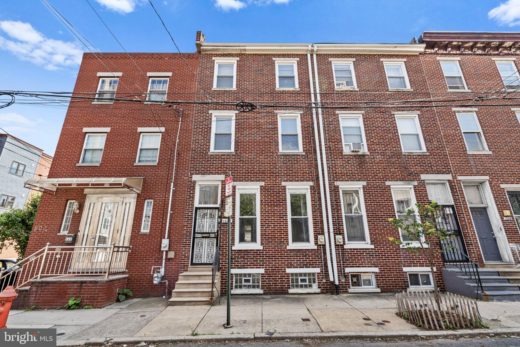 Welcome to 1202 Mount Vernon Street, a rare Philadelphia gem offering the perfect mix of modern updates, city convenience, and the hard-to-find bonus of off-street parking for up to two cars.
Step inside to discover fresh touches throughout. This 4-bedroom home has been recently painted, creating a bright, welcoming atmosphere. Hardwood flooring flows through the living room, dining room, and stairways. The kitchen features brand new porcelain flooring, an updated ceiling with recessed lighting, and plenty of space to cook, gather, and entertain. A convenient first-floor half bath adds practicality for daily living.

All four bedrooms and the dining room have been updated with new lighting and ceiling fans, and each bedroom includes a walk-in closet with recessed lighting. New flooring extends throughout all bedrooms and hallways. All three bathrooms have been upgraded with new sinks, new faucets, and new vanity cabinets, adding a clean, modern feel throughout the home. The clean, unfinished basement is ideal for storage or future customization.

Upstairs, the home continues with comfortable living spaces ready for your personal touch. With its thoughtful updates, functional layout, private patio, and rear parking, this property is move-in ready while still offering opportunities to make it your own.

Beyond the home itself, the location is a standout. Nestled in a historic and lively neighborhood, you’ll find popular restaurants, cafés, and entertainment spots just a short stroll away. Center City, the Art Museum, and the Avenue of the Arts are all within easy reach. Transportation is seamless, with quick access to Broad Street, I-76, I-95, and multiple SEPTA lines.

Nearby schools, universities, and green spaces—including Franklin Square and neighborhood parks—add to the convenience and appeal of this address.

1202 Mount Vernon Street offers a combination of location, updates, and the rare comfort of private parking—your gateway to enjoying the best of city living.