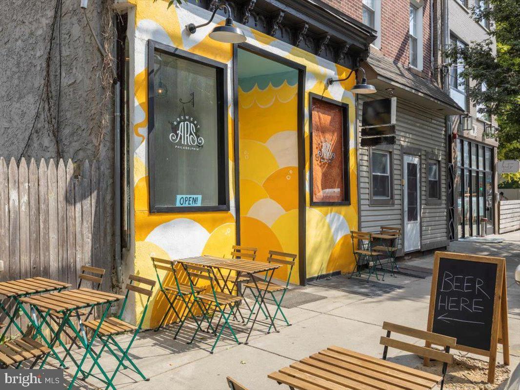 Don't miss this incredible opportunity to own a fully occupied, turnkey mixed-use investment property in the heart of Fishtown's thriving Frankford Avenue Business Corridor. This 3-unit commercial building features a long-term commercial tenant on the first floor, Brewery ARS, operating under a multi-year NNN lease, plus two residential apartments above that are both currently rented, providing immediate rental income.
The second-floor apartment offers 2 bedrooms and 1 full bath, while the third floor features a 1 bedroom, 1 bath unit. The property is zoned CMX-2 and has been well maintained with numerous updates throughout.
Recent improvements include a newer roof, exterior paint, brick pointing, concrete front steps, windows throughout, carpeting, front entry door, and a new brewery entrance. The third-floor apartment features a newer kitchen, washer and dryer, updated lighting, bathroom vanity, fresh paint, and carpeting. The second-floor apartment has also been updated with fresh paint, a newer kitchen countertop, bathroom vanity, and lighting fixtures.
The brewery has completed significant plumbing and electrical upgrades along with attractive cosmetic improvements, creating a modern industrial feel with exposed brick throughout the commercial space. The basement has also seen plumbing and electrical improvements along with a new Bilco door.
One of the added bonuses is the low annual real estate taxes of just $3,230. The property is also part of the Fishtown Kensington Area Business Improvement District (FKABID), which helps maintain the neighborhood through enhanced safety, cleanliness, and ongoing business district improvements.
Location is everything, and this property delivers. Walk to the Girard or Berks Market-Frankford Line stations and be in Center City in just two stops. 
Surrounded by new development, Federal Opportunity Zones, and continued neighborhood growth, this is an outstanding opportunity for investors looking to add a stabilized, income-producing asset in one of Philadelphia's most desirable neighborhoods.
Current Gross Annual Income: $56,856