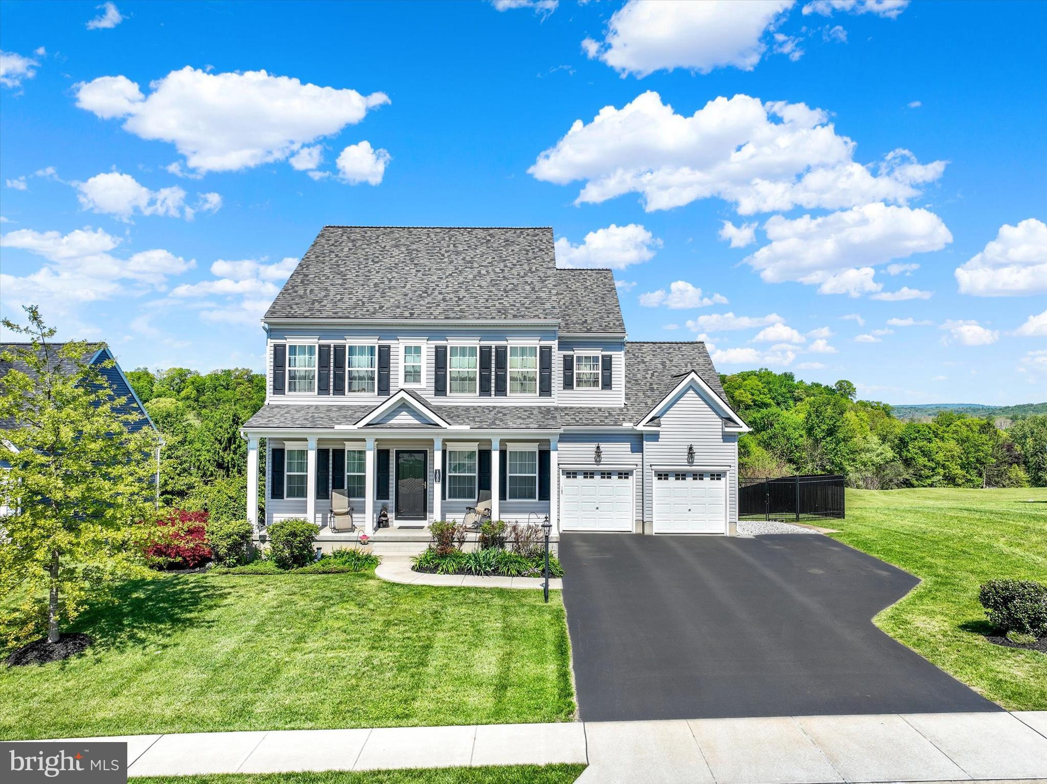 Some homes simply check the boxes. Others go far beyond them — and 100 Hollyhock Drive is one of those homes. Located in the highly desired Rolling Meadows at Rentzel Farm community in the Northeastern School District, this beautifully maintained home offers the perfect blend of neighborhood living, thoughtful upgrades, comfortable space, and an outdoor lifestyle that is truly hard to find.
From the moment you arrive, the curb appeal makes a lasting first impression. The classic exterior, welcoming front porch, manicured landscaping, new roof, fenced yard, and extra-wide driveway with additional parking all set the tone for a home that has been well cared for and thoughtfully enjoyed. Perfectly positioned within one of York counties most desirable communities, this property offers a peaceful setting surrounded by picturesque countryside while still being just minutes from shopping, dining, and everyday conveniences. With easy access to I-83, Route 30, and only minutes to the PA Turnpike, the location is ideal for those who want comfort, convenience, and community all in one place.
Inside, the main level offers a warm and inviting layout designed for both everyday living and entertainment. A formal dining room provides the perfect space for holiday meals, special gatherings, and Sunday dinners, while the comfortable living areas flow easily into the heart of the home. The kitchen features abundant cabinetry, an island with seating, generous workspace, and a walk-through butler’s pantry connecting the kitchen and dining room — a wonderful feature for entertaining, serving, storage, and everyday convenience. The kitchen also opens to the family room and breakfast area, making it easy to cook, gather, and stay connected. Natural light fills the rear of the home, drawing your eye directly toward one of the property’s most impressive features — the incredible outdoor living space.
The screened-in porch is not just a porch — it feels like an outdoor living room. With electricity, recessed lighting, a TV, fireplace, beautiful ceiling detail, and peaceful elevated views, this space was made for morning coffee, quiet evenings, game days, summer dinners, and relaxing after a long day. Just beyond the screened porch is a large adjoining deck, creating even more room to entertain, grill, or simply enjoy the view. Whether you are hosting friends, watching the seasons change, or enjoying a quiet night at home, this setup offers the kind of lifestyle buyers dream about. The outdoor features continue with a swim spa, perfect for hot summer days, and a hot tub, for those cool fall evenings, and year-round enjoyment. The fenced backyard offers space to play, garden, relax, or let pets enjoy the outdoors, while the rear setting gives you a wonderful sense of openness and privacy. Between the screened porch, deck, swim spa, fenced yard, and lower-level covered area, this home offers multiple ways to enjoy outdoor living — and that is something you simply do not find every day.
Upstairs, the home offers four spacious bedrooms, including a large primary suite with two walk-in closets and a private bath. The additional bedrooms provide plenty of flexibility for family, guests, office space, hobbies, or whatever life requires. A convenient second-floor laundry room adds to the thoughtful design and makes daily living much easier.
The basement is another major opportunity. With a full finished bathroom already in place, walkout access to the backyard, and a large unfinished area just waiting to be completed, the possibilities are endless. 
Rolling Meadows is a community known for its welcoming neighborhood feel, scenic surroundings, and desirable amenities. Enjoy access to a community swimming pool, picnic area, basketball court, playground, and open common areas — all adding to the lifestyle this neighborhood provides.