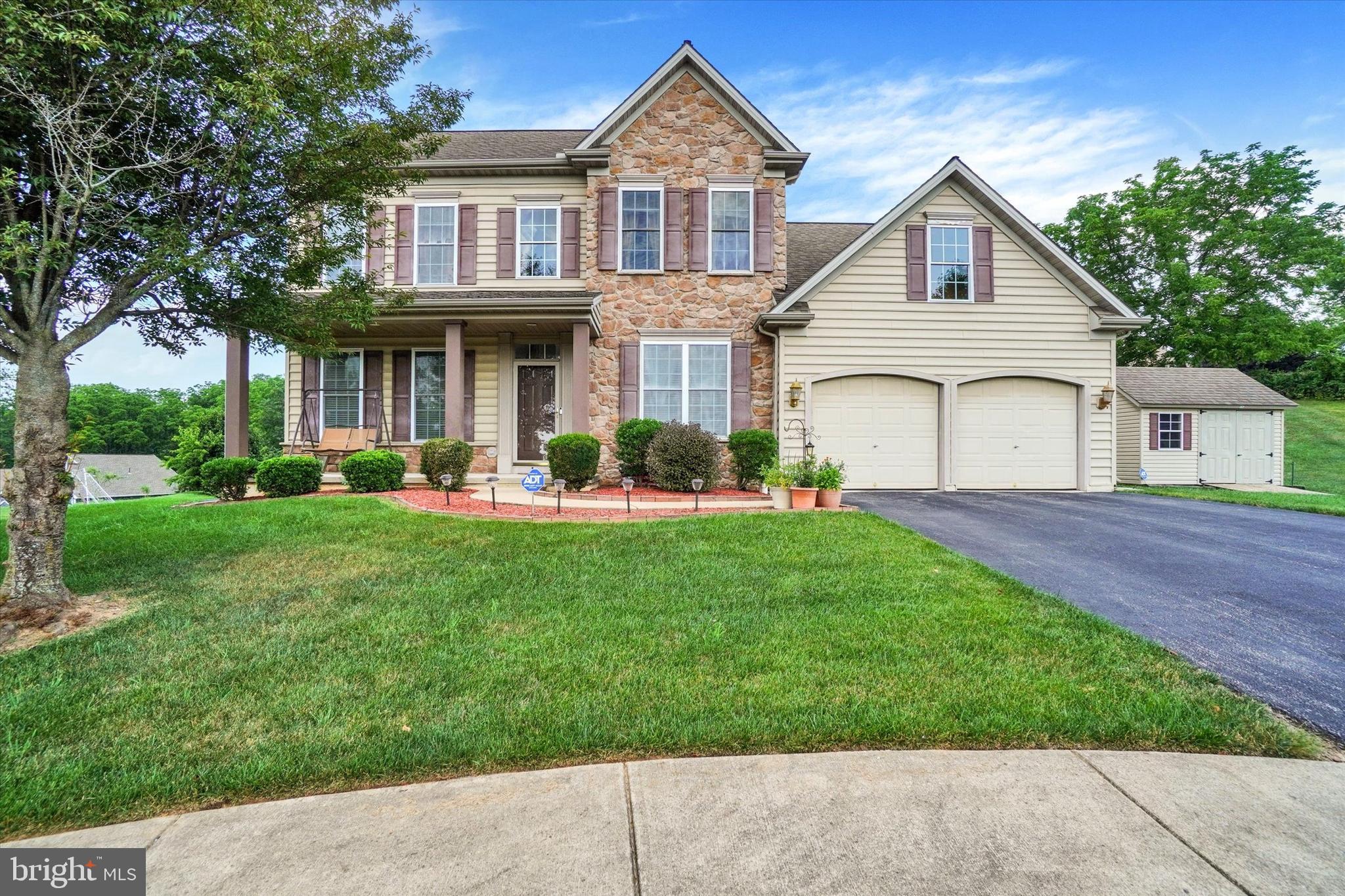 Don't miss this exceptional 4BR, 2.5BA two-story home with 2,528 sq. ft. located on a quiet cul-de-sac in the desirable Dallastown School District. Arguably the best lot in the development, this property offers a large, private backyard, rear deck, and beautiful sunset views from the front of the home. The spacious floor plan features a formal dining room, private office, and an inviting family room with a gas fireplace. The beautifully appointed kitchen includes granite countertops, stainless steel appliances, a center island, and a sunny breakfast area. The spacious primary suite offers a walk-in closet and private bath. Three additional bedrooms provide plenty of room for family, guests, or hobbies. Additional highlights include a two-car garage, storage shed, and exceptional pride of ownership throughout. Meticulously maintained, exceptionally clean, and truly move-in ready? This is a home you won't want to miss!
