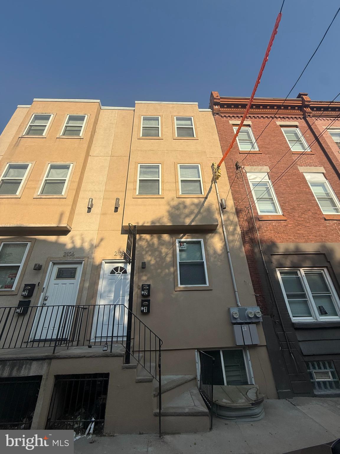 Invest in a turnkey gem with this updated and well-kept large duplex located in the stable student housing community of Temple University. Immediate rental income is yours with this property's proven rental history. This three-story duplex offers a unique opportunity for both student housing or multi-family living. Unit 1 boasts a bi-level layout with 5 bedrooms, 3 bathrooms, and a modern kitchen with stone countertops, stainless-steel appliances and a backyard and is rented at $1695/m. Unit 2, currently rented for $1800 a month, offers the same bi-level layout with 5 bedrooms, 3 bathrooms, and a modern kitchen with stone countertops and stainless-steel appliances. Both units include a washer/dryer package for added convenience. Enjoy the close proximity to Temple University Campus and the variety of shops and restaurants located on North Broad Street. Commuting to Center City Philadelphia is a breeze from this location. The roof was replaced in  May 2025 and offers a 10 years warranty. Also the stucco was repaired at the same time and comes with an 8 year warranty. Don't miss out on this opportunity to bring in rental income immediately. Schedule a viewing today and add this property to your portfolio!