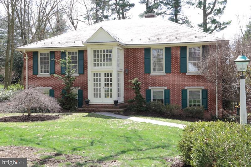 Bright and airy well maintained home that features large family room with fireplace, sunroom and eat-in kitchen with large breakfast bar. Master suite with whirlpool tub, two Jack & Jill baths. Bedroom with vaulted ceiling & fireplace. 1 car attached garage & 2 car detached garage with 25'x13' second flr workshop. Large yard with mature landscaping.