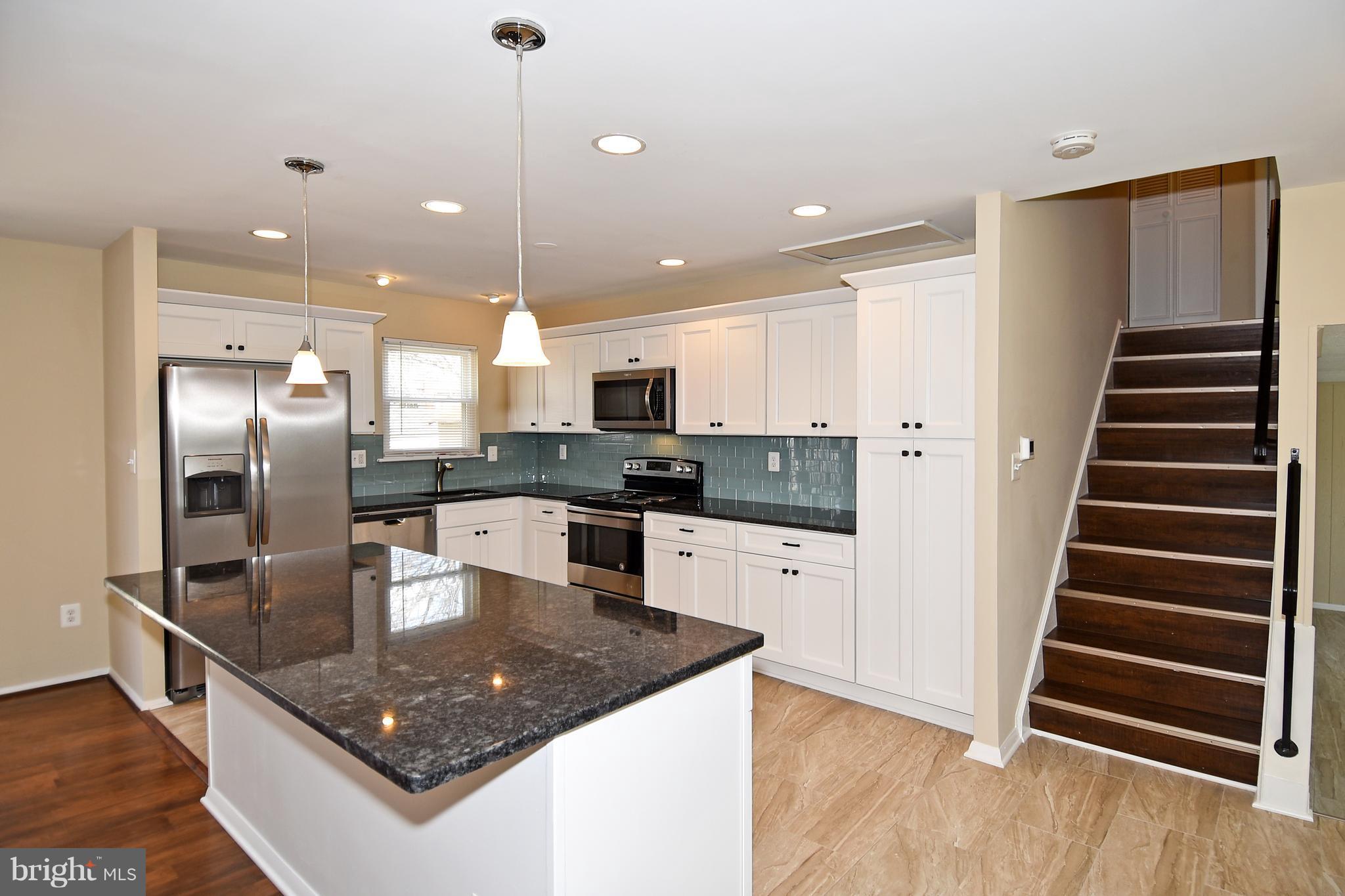 COMPLETELY RENOVATED Featuring Open Concept Kitchen with 42" Cabinets, Beautiful Glass Backsplash, Breakfast Bar, Granite & Stainless Appl. Living Rm & Dining Rm w/ French Doors Opening to Patio. Upper Level w/ Spacious Owner's Suite, Updated Master Bath, Two Add'l BRs & Updated Hall Bath. Lower Lvl Feat. Family Rm w/ Fireplace & Walkout. Prefer 2+ Year Lease & Quick Move-In. 83K Qualifying income