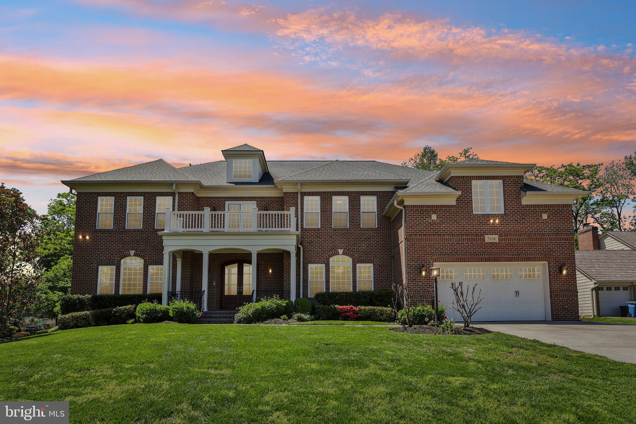 Welcome to this exceptional custom-built all-brick Colonial, built in 2013 and ideally situated on a quiet cul-de-sac with direct access to scenic Lewinsville Park. Offering over 8,000 square feet of thoughtfully designed living space, this stunning residence seamlessly blends timeless elegance with modern luxury.
This expansive home features 6 bedrooms, 6 full baths, and 1 half bath, including a private in-law suite with its own kitchenette, A grand two-story foyer with a dramatic curved staircase sets the tone, while Brazilian cherry hardwood floors span all three levels. Enjoy the beautiful water feature outback with views of the woods, enjoy the breeze from the elegant screened in porch or sit cozily by one of the two gas fireplaces.  The gourmet main kitchen is a chef’s dream, showcasing updated cabinetry, a butler’s pantry, stainless steel Jenn-Air appliances, and a large granite island with bar seating. A second full kitchen adds flexibility for entertaining or multi-generational living.
The main-level primary suite offers comfort and privacy, while the upper level features an additional luxurious primary suite complete with a sitting room, spa-inspired bath with jetted tub and glass-enclosed shower, dual walk-in closets, and a striking three-sided gas fireplace.
The fully finished lower level is designed for entertaining, featuring a spacious recreation room, wet bar, and four versatile bonus rooms ideal for a home office, media room, gym, or playroom.
Additional highlights include a 2-car garage equipped with Tesla chargers, two laundry rooms for added convenience and numerous recent updates, including HVAC systems, water heater, and appliances reflecting meticulous ownership throughout.
Located just minutes from Tysons Corner, Washington Dulles International Airport, and walking distance to McLean High School, this home offers unmatched convenience paired with luxury living.