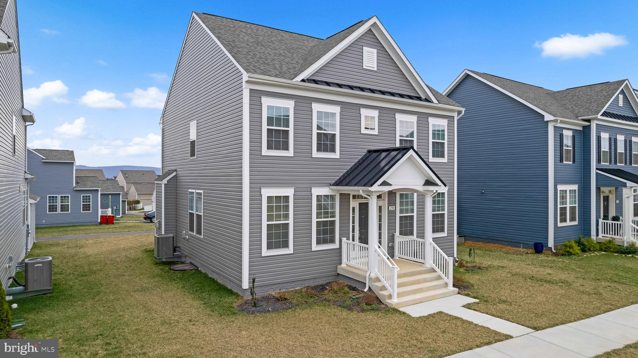 This beautiful, like-new Colonial in the desirable Huntfield community offers the perfect blend of comfort and elegance. Less than two years old, this home is still in like-new condition and still has warranties, completely move-in ready, featuring rich vinyl floors throughout, plush carpeting in the bedrooms, and a spacious gourmet kitchen with a large island, wall oven, and cooktop—ideal for any chef. The cozy family room includes a gas fireplace, perfect for relaxation. The luxurious primary suite boasts a tray ceiling, a giant walk-in closet, and a spa-like bathroom with a soaking tub and walk-in shower. With 4 bedrooms and 2.5 bathrooms, there’s plenty of space for everyone. The partially finished basement offers endless possibilities, including rough-in plumbing for a future bathroom and 5th bedroom. Outside, the well-maintained exterior and lawn complement the vibrant community amenities, including sidewalks, playground, and tennis/pickleball courts. Future amenities include swimming pool, basketball courts and community center. The HOA handles maintenance, snow removal, and trash services, allowing for a low-maintenance lifestyle. Parking is easy with a paved driveway in back or on-street parking in front.  Only a couple miles from VA and MD, it's the perfect location. This exceptional home is a must-see! Schedule a showing today! Motivated Seller!