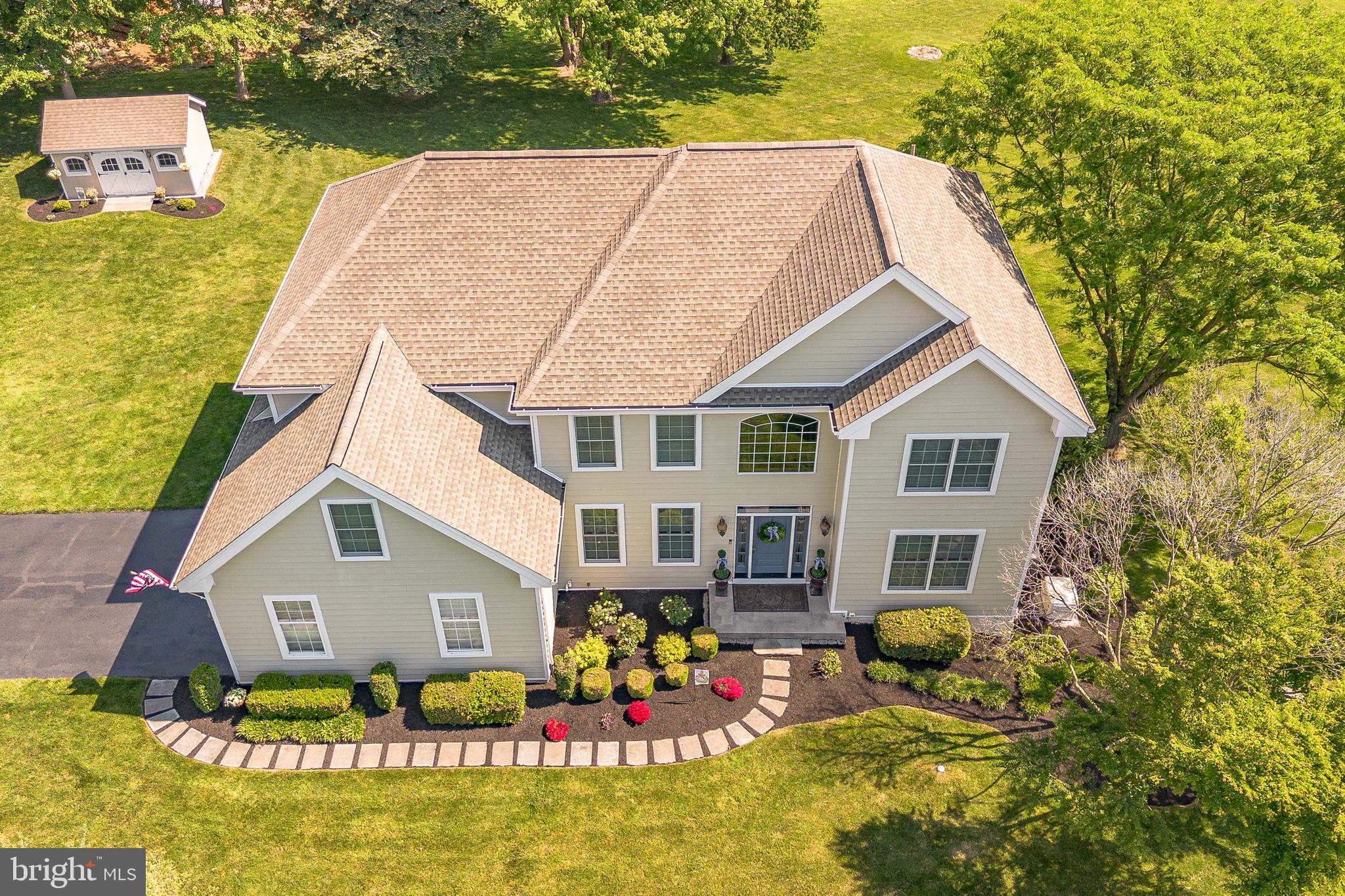 Welcome to 168 Walnut Run Road, a stunning move-in ready 4-bedroom, 3.5-bathroom single family home located in the sought-after Laurel Pointe community of Landenberg. Set on over an acre of land, this property offers a peaceful setting with spacious indoor and outdoor living areas designed for both everyday comfort and entertaining. As you approach the home, you are welcomed by a 2-car garage, an expansive 6-car driveway, and beautiful curb appeal. Inside, the impressive two-story foyer features a split staircase and luxury vinyl plank flooring that extends throughout the entire main level, creating a seamless and modern feel. To the right of the foyer, the living room offers crown molding and abundant natural light, while the formal dining room to the left features crown molding, chair rail, and wainscoting for a classic touch. The private home office is highlighted by a double-sided gas fireplace shared with the dramatic great room. The great room is filled with natural light and features vaulted ceilings, skylights, and direct access to the deck, creating an inviting central gathering space. The spacious eat-in kitchen is beautifully appointed with quartz countertops, an island with seating, stainless steel appliances, pantry storage, and plenty of workspace for cooking and entertaining. Finishing the main level is a convenient laundry room with access to the driveway and a powder room. Upstairs, the primary suite offers a true retreat with a tray ceiling, ceiling fan, two walk-in closets, and a spacious sitting room perfect for a private lounge, reading area, or additional office space. The luxurious en-suite bathroom features double sink vanities, a soaking tub, and a step-in shower. Three additional bedrooms, all with ceiling fans and one featuring two closets, provide comfortable accommodations for family or guests. A full hall bathroom with double sink vanities and a tub/shower combination completes the second level. The fully finished walk-out basement adds exceptional versatility to the home. The spacious family room is ideal for entertaining, movie nights, or game days. You also have a bonus room perfect for guest space, a full bathroom, and an additional flex room that could serve as a wine cellar, lounge area, or hobby space. A separate storage room with direct access to the backyard adds even more functionality. Outside, the expansive yard offers plenty of room to relax, entertain, or enjoy the surrounding nature. The property also features an electric dog fence that spans the entire lot, providing added convenience and peace of mind for pet owners. The composite deck completes the outdoor space. Additional features include a whole-house generator for added peace of mind. This home has been thoughtfully maintained with many major updates already completed, making it truly move-in ready for its next owner. Located within a top-rated school district, this property offers the perfect combination of comfort, convenience, and long-term value for any family. Conveniently located near White Clay Creek Preserve Trails, local shopping, grocery stores, restaurants, and more, this home offers the perfect balance of privacy, space, and accessibility. Don’t miss the opportunity to make 168 Walnut Run Road your next home.