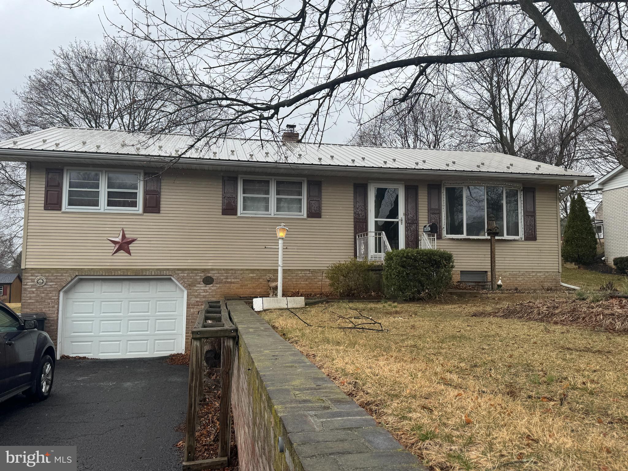 NICE HOME IN WAYNESBORO, PA! This 3-bedroom, 1.5-bathroom home offers comfort, character, and convenience. Featuring a spacious living room, dining room, and kitchen, it’s perfect for everyday living and entertaining. The finished basement provides a cozy family room, while the laundry room and one-car garage add extra functionality. Hardwood floors run through much of the home, adding warmth and style, and the durable tin roof brings both charm and longevity. Situated in a prime location, this home is just minutes from Rt. 16, restaurants, schools, and shopping, making it ideal for families or anyone seeking convenience. This property will be offered at auction on Thursday April 3, 2025 @ 4:30pm. The List price in no way represents a minimum, starting, or acceptable bid.