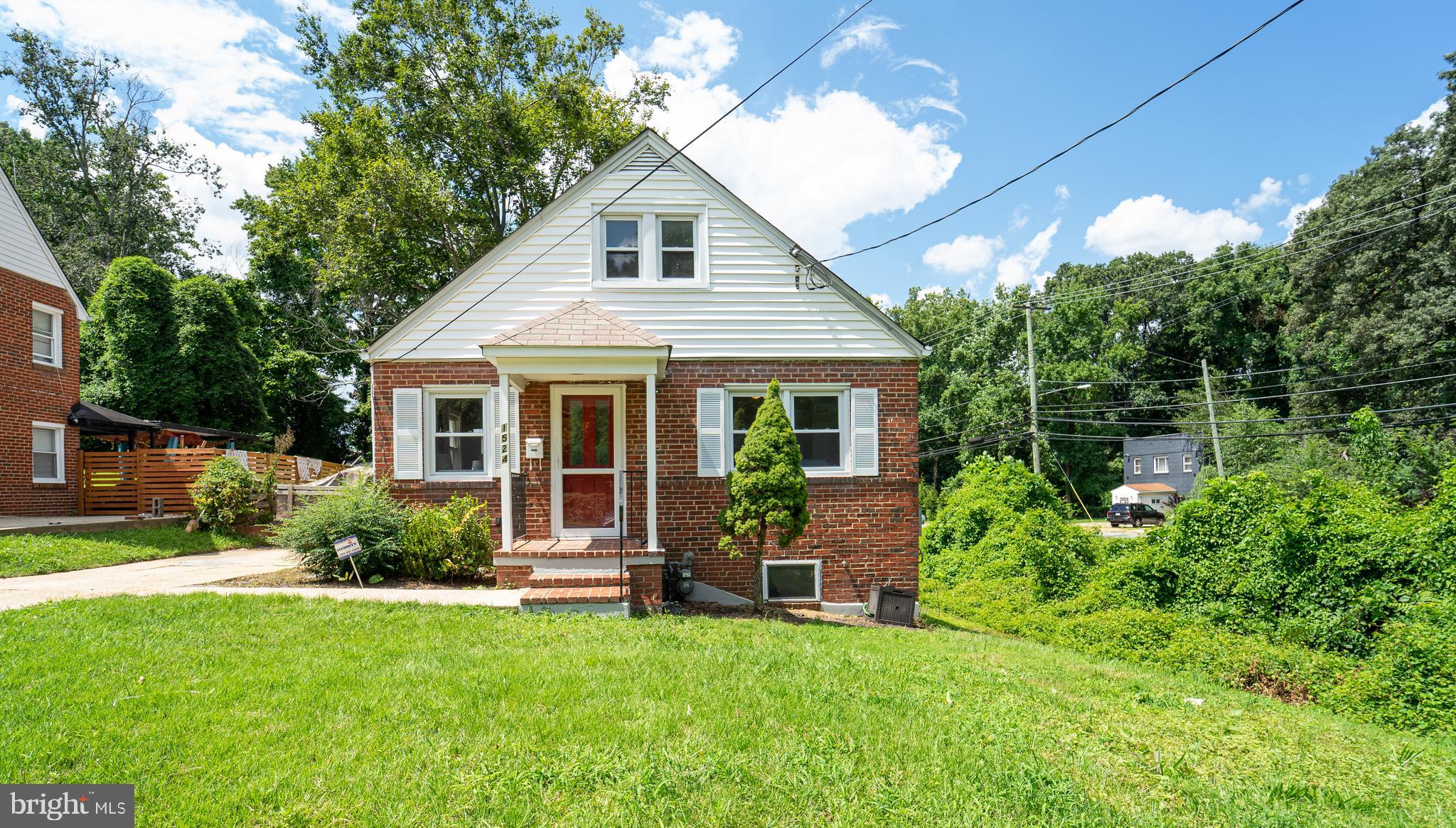 This gorgeous, spacious 3-level house has a corner lot, a long driveway, and plenty of parking space. Four bedrooms and two fully remodeled bathrooms. Stainless steel appliances are in the eat-in kitchen, floors throughout, a walkout basement, and a washer and dryer.  Great location, close to DC, route 295, and Route 50.   Great outdoor space on this corner lot for barbecues, large family gatherings, and your pets! Build your oasis!   The seller has priced your future home to sell quickly! Don't miss it!