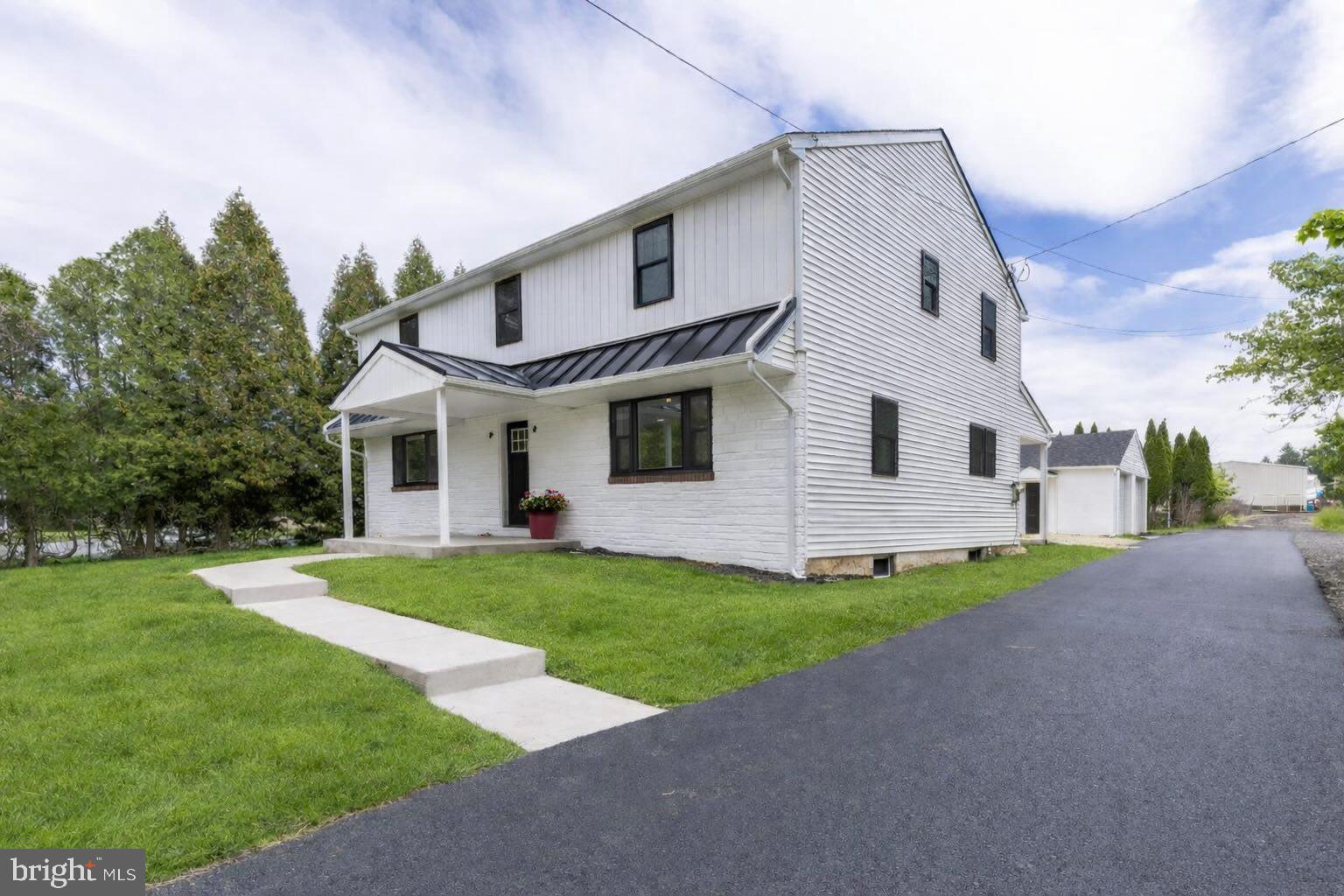 Welcome to 516 Church Road in the highly sought-after Methacton School District, where classic charm meets modern farmhouse style. Originally built in 1949 and extensively renovated and expanded in 2021, this home offers the perfect blend of character, thoughtful updates, and modern comfort.
Step inside to a bright, open floor plan filled with natural light and a fresh, contemporary farmhouse aesthetic. The heart of the home is the spacious kitchen, featuring granite countertops, stainless steel appliances, generous cabinetry, and ample workspace, all flowing seamlessly into the main living areas—perfect for everyday living and entertaining.
The main level offers exceptional flexibility, including a bedroom (or ideal office, study, or playroom) along with a full bathroom, making it perfect for guests, remote work, or multigenerational living.
Upstairs, you’ll find four additional bedrooms, including a comfortable owner’s suite with its own full bath. Convenience continues with second-floor laundry, making daily routines easier and more efficient.
Additional highlights include dual-zone HVAC, a full-house generator for peace of mind, a detached 2 car garage, and thoughtful updates throughout the home.

Outdoor living is just as inviting with charming front and rear porches, ideal for morning coffee or relaxing evenings. The property also features a detached two-car garage and a location that’s hard to beat—just a short walk to Eskie Park, offering green space, recreation, and community right outside your door.
