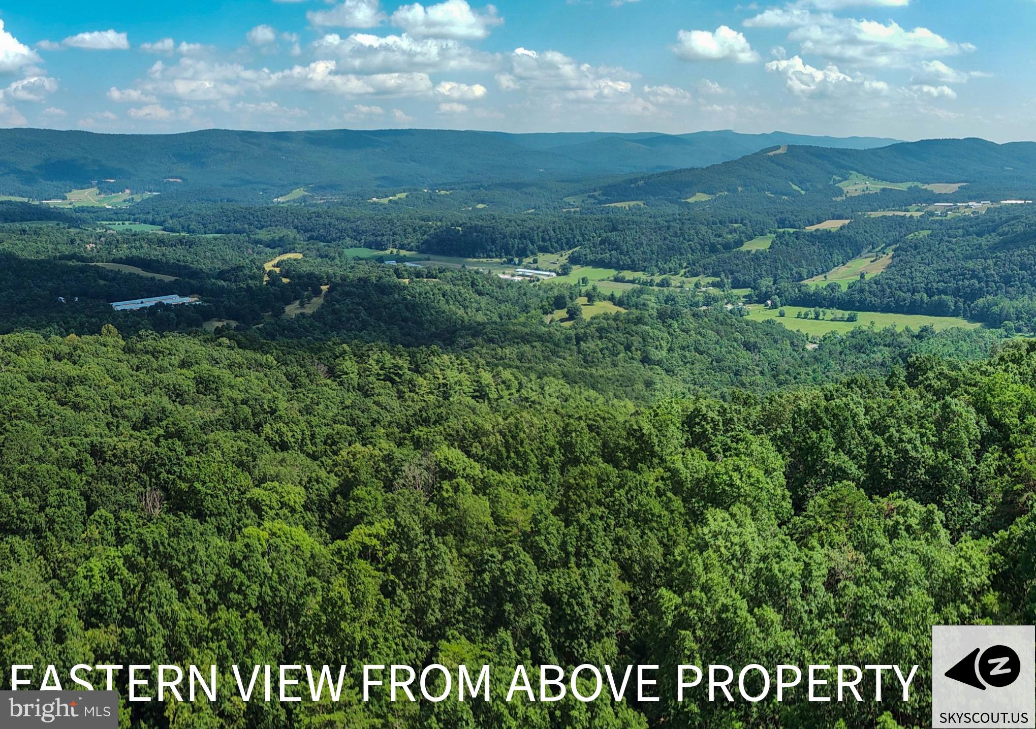 Escape to the tranquility of Lost River, West Virginia, with this exceptional 79-acre property, offering a unique blend of natural beauty, potential for development, and agricultural use. This is a rare opportunity to own a significant piece of land with a variety of features that cater to a wide range of interests.
Property Highlights:
Multiple Building Sites: The expansive 79 acres provide several ideal locations for constructing your dream home, a family compound, or a retreat. These sites are thoughtfully situated to maximize privacy and take full advantage of the stunning, long-range mountain views that define the Lost River landscape.
Panoramic Views: From elevated points on the property, you can enjoy breathtaking views of the rolling hills and picturesque valleys of Hardy County. The vistas are a perfect backdrop for a morning coffee or an evening sunset.
Established Access Road: The property includes a well-maintained access road, ensuring easy entry and exit to all parts of the acreage. This feature simplifies any future construction or land management plans.
6 Acres of Farmland: A valuable asset, this parcel includes approximately 6 acres of fertile farmland. Whether you're an aspiring farmer, a hobbyist looking to grow your own crops, or an equestrian seeking a pasture, this land is ready for your vision.
Untapped Potential: With a mix of wooded and open land, the possibilities are endless. Create hiking trails, establish a private hunting ground, or simply enjoy the vastness of your own private sanctuary.
Prime Location: Nestled in the heart of Lost River, this property offers a peaceful, rural setting while remaining accessible to local amenities. Lost River is known for its natural beauty, friendly community, and proximity to outdoor recreation, including Lost River State Park and the George Washington National Forest.
This 79-acre tract is more than just land; it's a canvas for your future. Whether you're looking for a private estate, a working farm, or an investment property, this listing provides the space, views, and potential to make your dreams a reality. There is a family graveyard on the property and there is an easement in place for it's use.