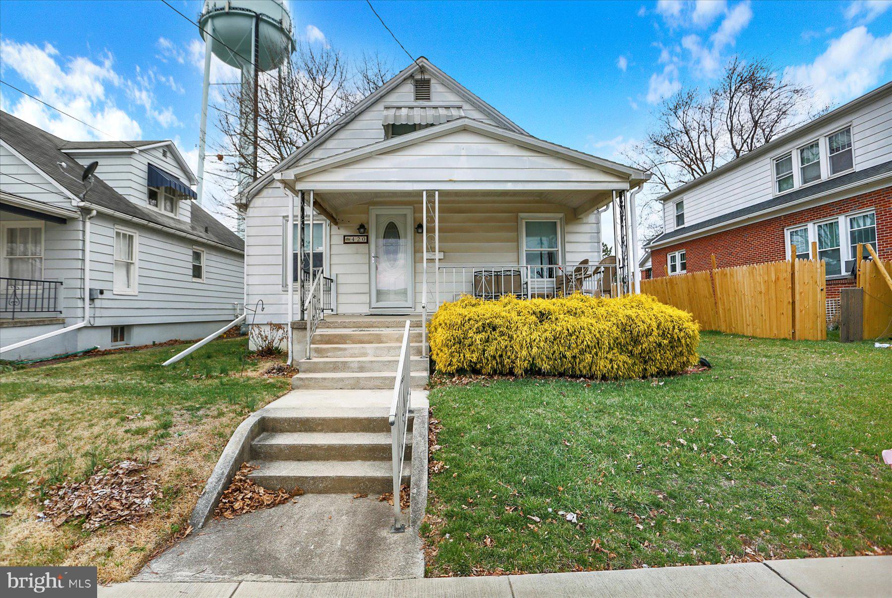 Adorable single family home with neutral paint and flooring on the first floor with living room, sitting/family room, formal dining room, cozy kitchen with a first floor laundry and full bath. Second floor with 2 bedrooms and hardwood floors. Nice sized yard and detached garage, make this a must see!